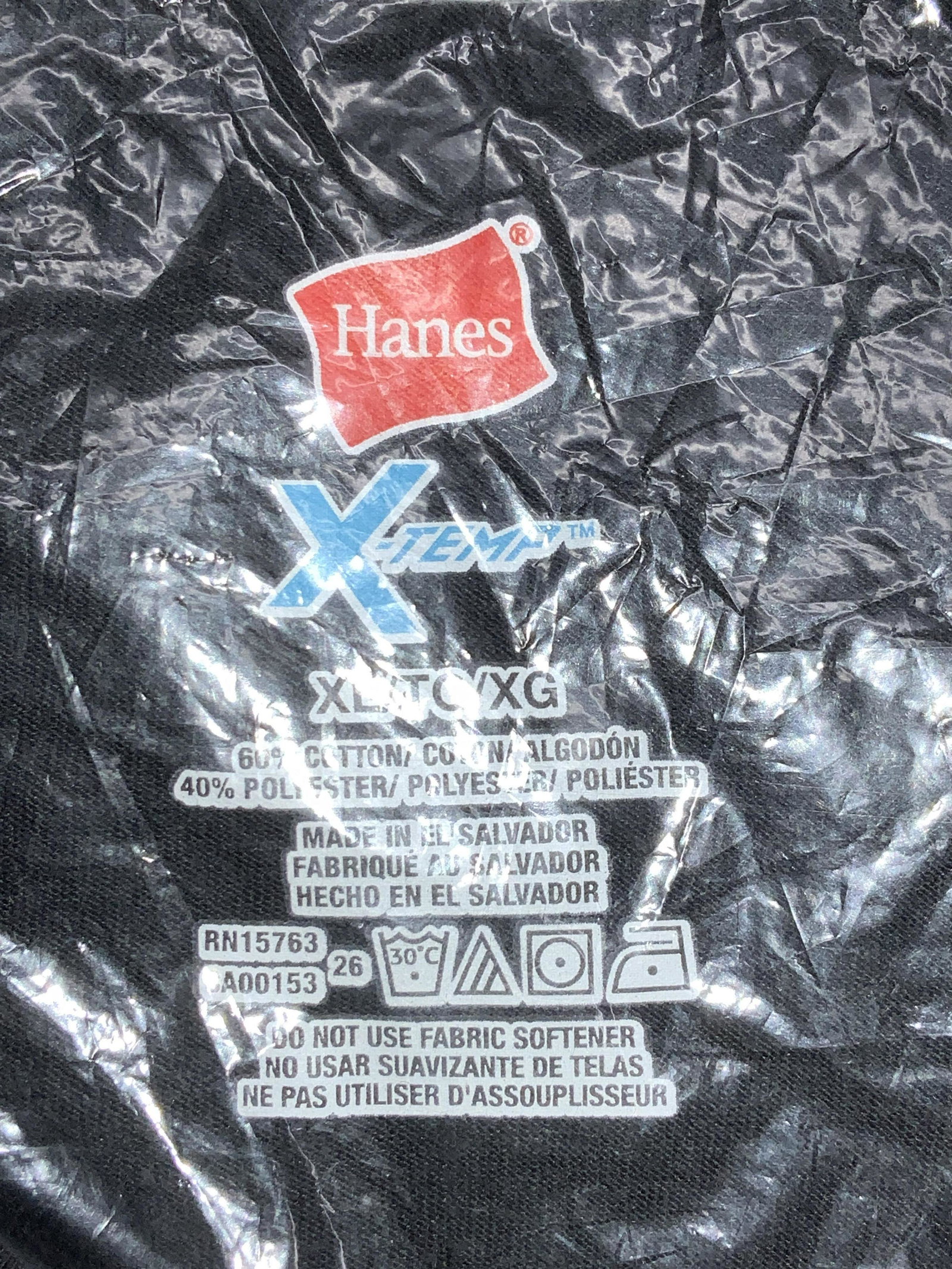 Hanes Black Cotton Poly Tee Shirt, NIP Sz XL: Black Hanes Tee Shirt, Size XL, 60% cotton. 40% polyester, sealed in plastic packaging. Possibly short sleeve. V neck. T Shirt, Tee Shirt, Wearables, Plus Size Shirt, casual wear, Loungewear, Sportswe