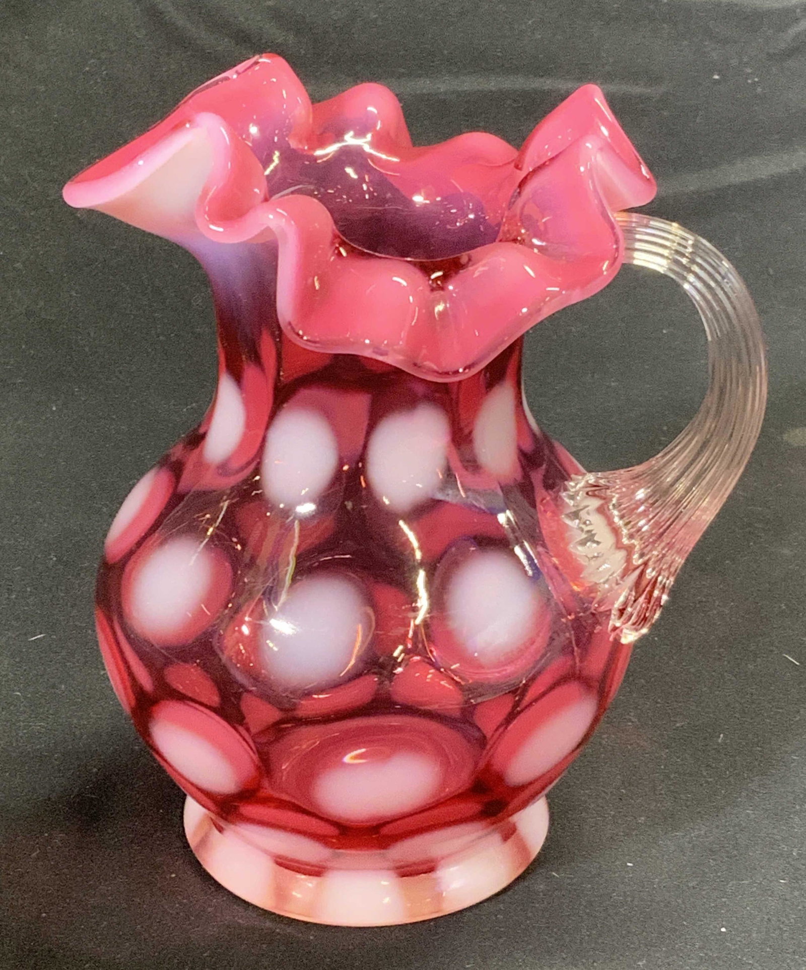 Vintage Fenton Style Pink Dot Art Glass Creamer: Vintage Fenton style art glass creamer in pink with white dot decoration and handkerchief glass rim. Measures approx. 4 inches diameter and 5.25 inches tall. Art glass, Fenton style, glass creamer, ar