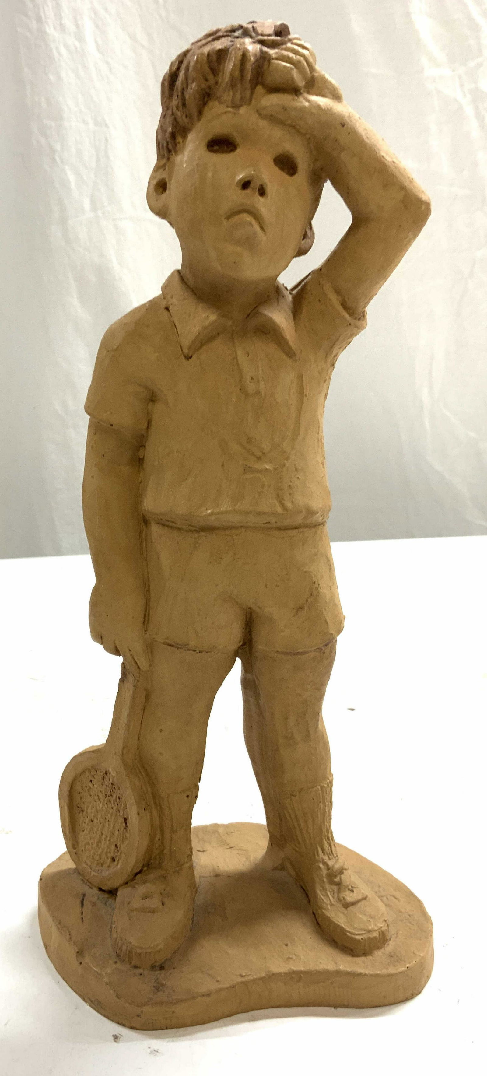 LEE BORTIN Vintage Clay Boy W Tennis Racket: Figure is signed L BORTIN. Piece appears to possibly be clay/ ceramic. Depicts a boy holding a tennis racket. Measures approx 11.5 inches tall 5.5 inches wide 4 inches deep. Boy with Tennis racket, Le