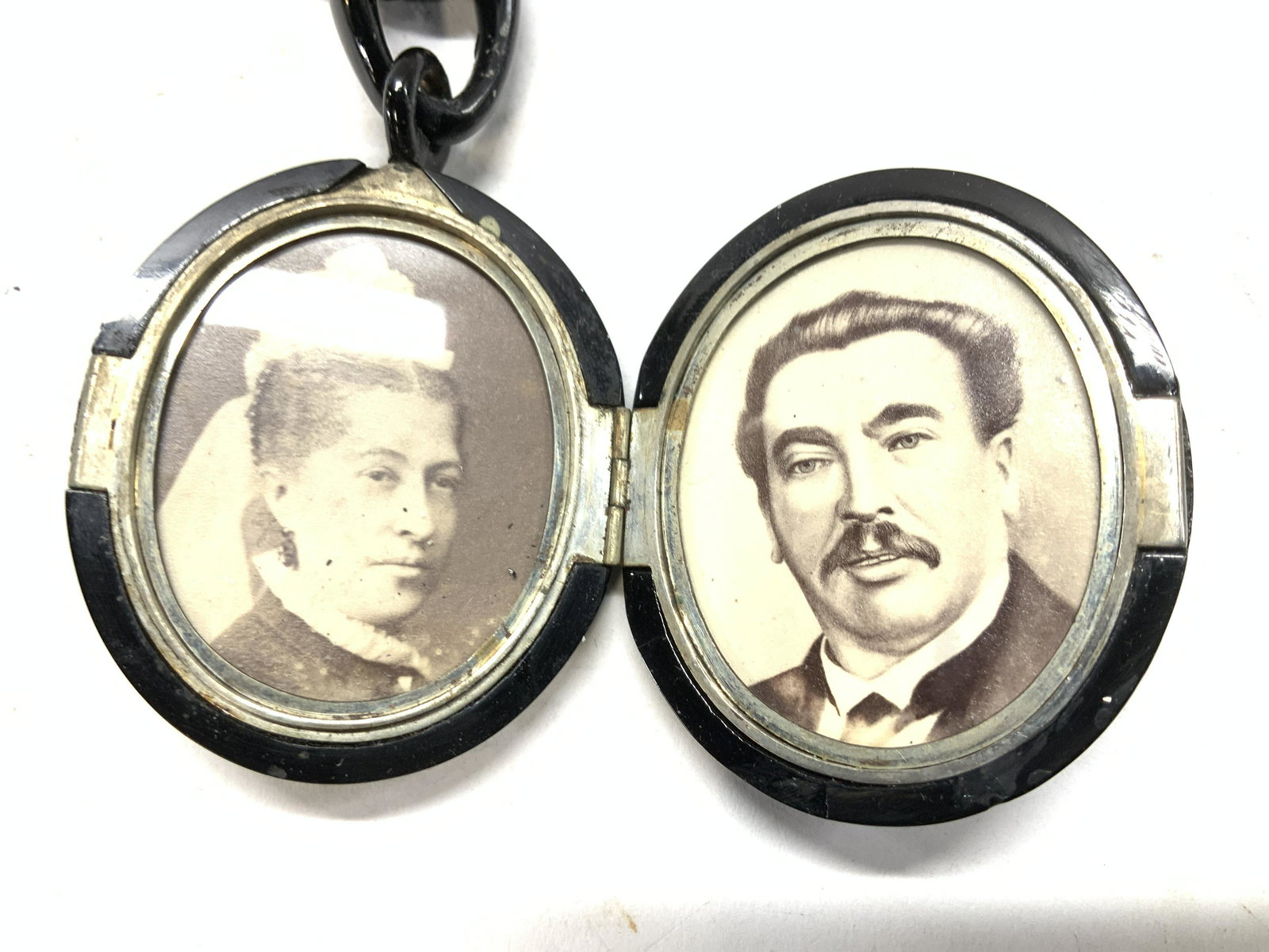XL Portrait Locket Pendant Necklace: Black resin pendant portrait locket, measures 3.75 in. L with bale, 1.75 in. W. Portrait size app 1 5/8 x 1 3/8 in. Hangs on black braided rope, 22 in. Long Chunky jewelry, statement Jewelry, vintage 