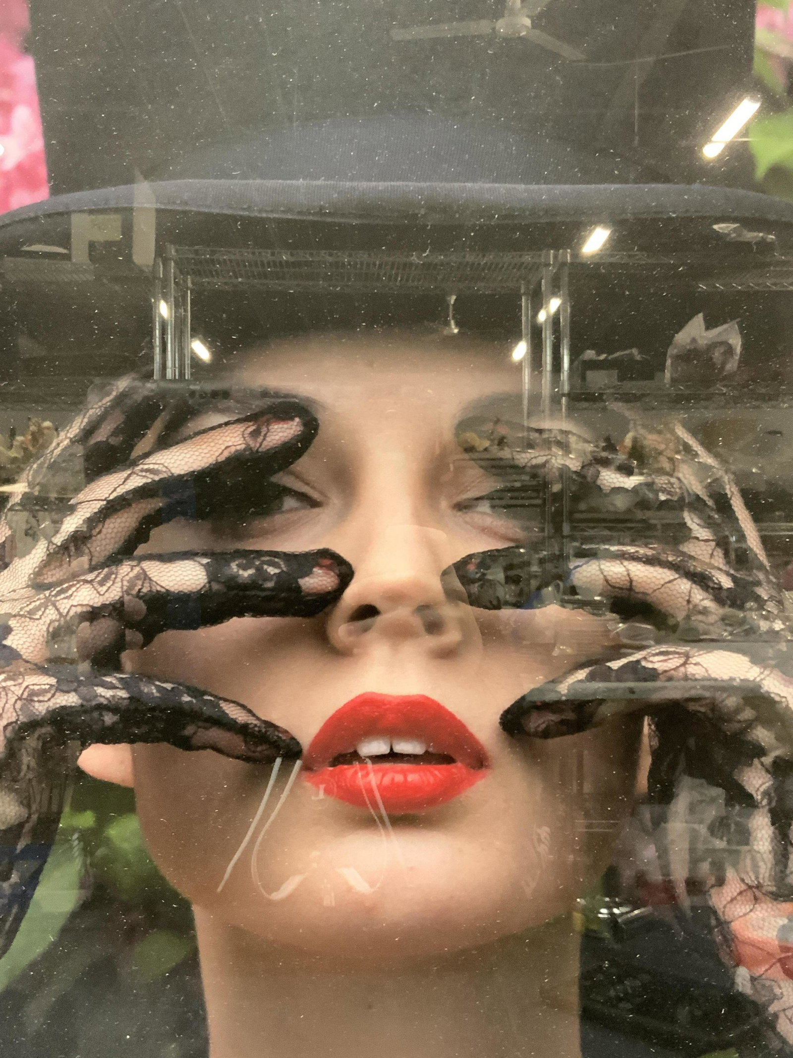 Signed Limited Edition Portrait Photograph: Signed on lower right corner in graphite, illegibly. Marked on lower left corner 2/25 Subject depicts a woman in a black top hat wearing lace gloves with her hands on her face. Approximately 25 x 19.5