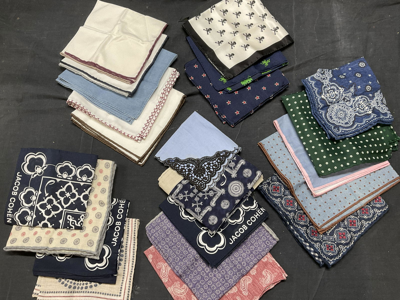 Lot 22 Silk, Linen and Cotton Handkerchiefs,: No visible wear to pieces. Labels include Jacob Cohen, Made in Italy, Rosi Collection Linen, BRUNELLO Cucunelli. (See photos for labels) . Minor discoloration to pieces. Largest piece measures approx.