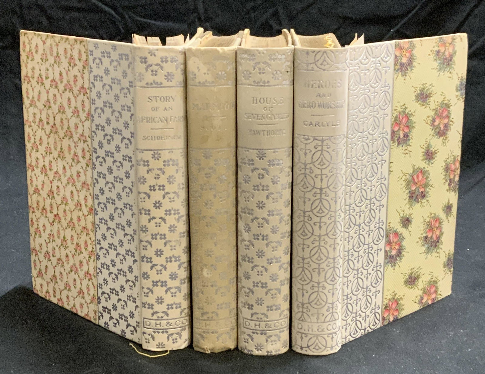 Set 4 Antique Books, Nathaniel Hawthorne & More: Set of 4 antique books published by Donahue, Henneberry, and Co. No publication dates listed, circa early 20th century. Titles include The House of Seven Gable by Nathaniel Hawthorne, Marion by Sir Wa