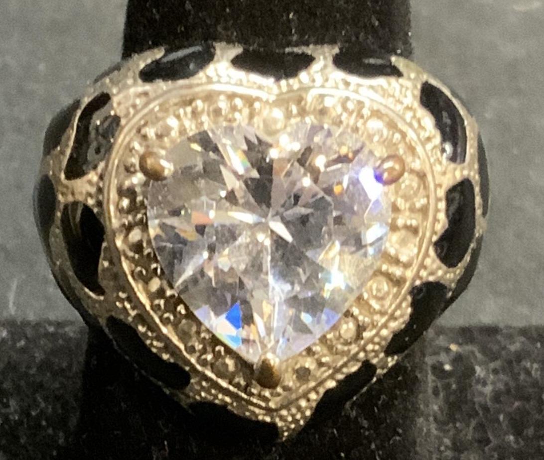 GUESS Crystal Heart Enameled Cocktail Ring: GUESS Heart cut crystal cocktail ring with enameled decoration. Band measures approx. .75 inches wide. Ring size 7. Designer label to interior band. Surface wear consistent with exposure. Estate jewel