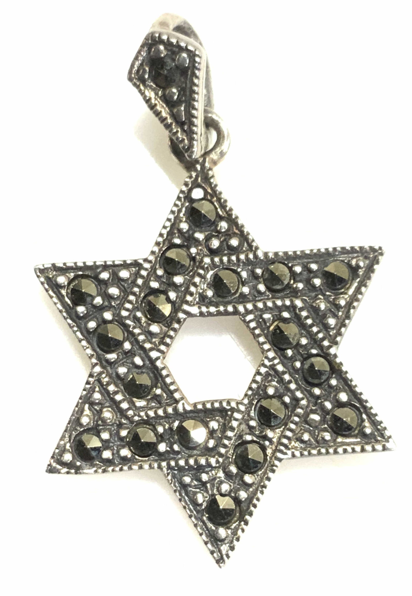 Sterling Silver Marcasite Star of David Pendant: Sterling Silver and Marcasite Star of David pendant , marked 925 , measures 1 x .75 in. Sterling Silver Marcasite pendant, Sterling Silver Star of David Pendant, Judaica Fine Jewelry, Israelica fine j