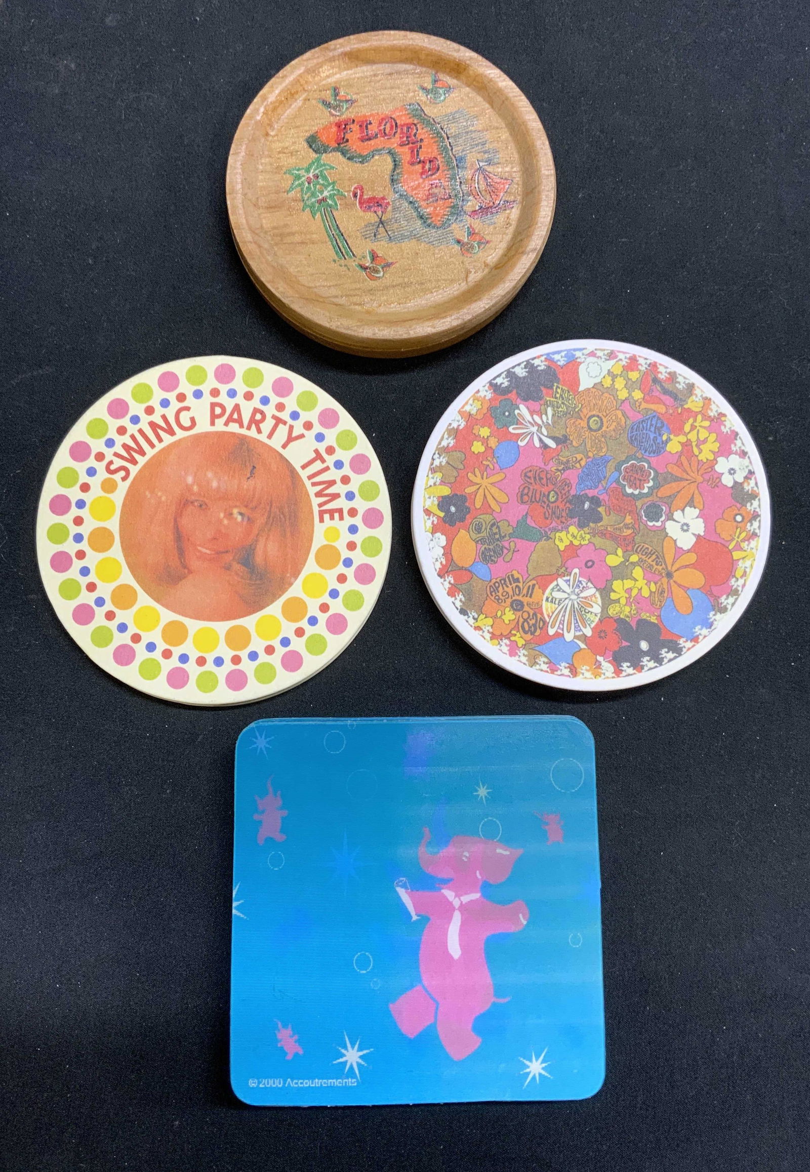 Group 20 Coasters, Elephant, Florida, Party, More: Group of 20 coasters. 5 paper coasters with figural and dot motif that read Swing Party Time, measure approx. 3.5 inches diameter. 9 paper coaster with floral motifs, measure approx. 3.5 inches diamet