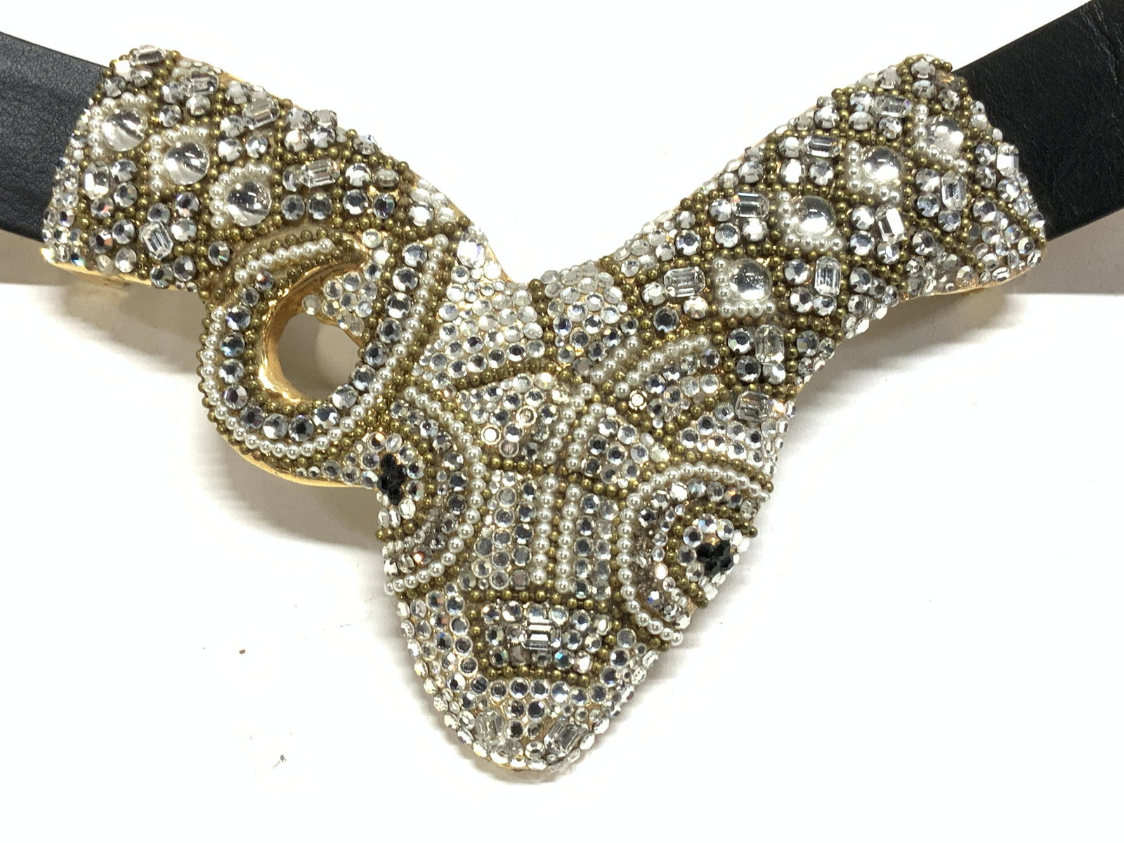 Ermine Beverly Hills Heavy Rhinestone Snake Belt: Luxury and rare ERMINE BEVERLY HILLS VINTAGE 1980s Black Leather belt with heavy center rhinestone snake in center ( mounted on tilted heavy Metal). Made in Austria. Has adjustable hook closure that s