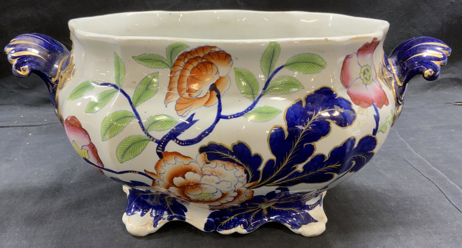 Vintage Chinese Ironstone Imari Centerpiece: Vintage Chinese ironstone centerpiece vessel with floral imari pattern and gilt decoration. Marked ironstone, china to underside. Some surface wear consistent with exposure. Measures approx. 15 x 10 x