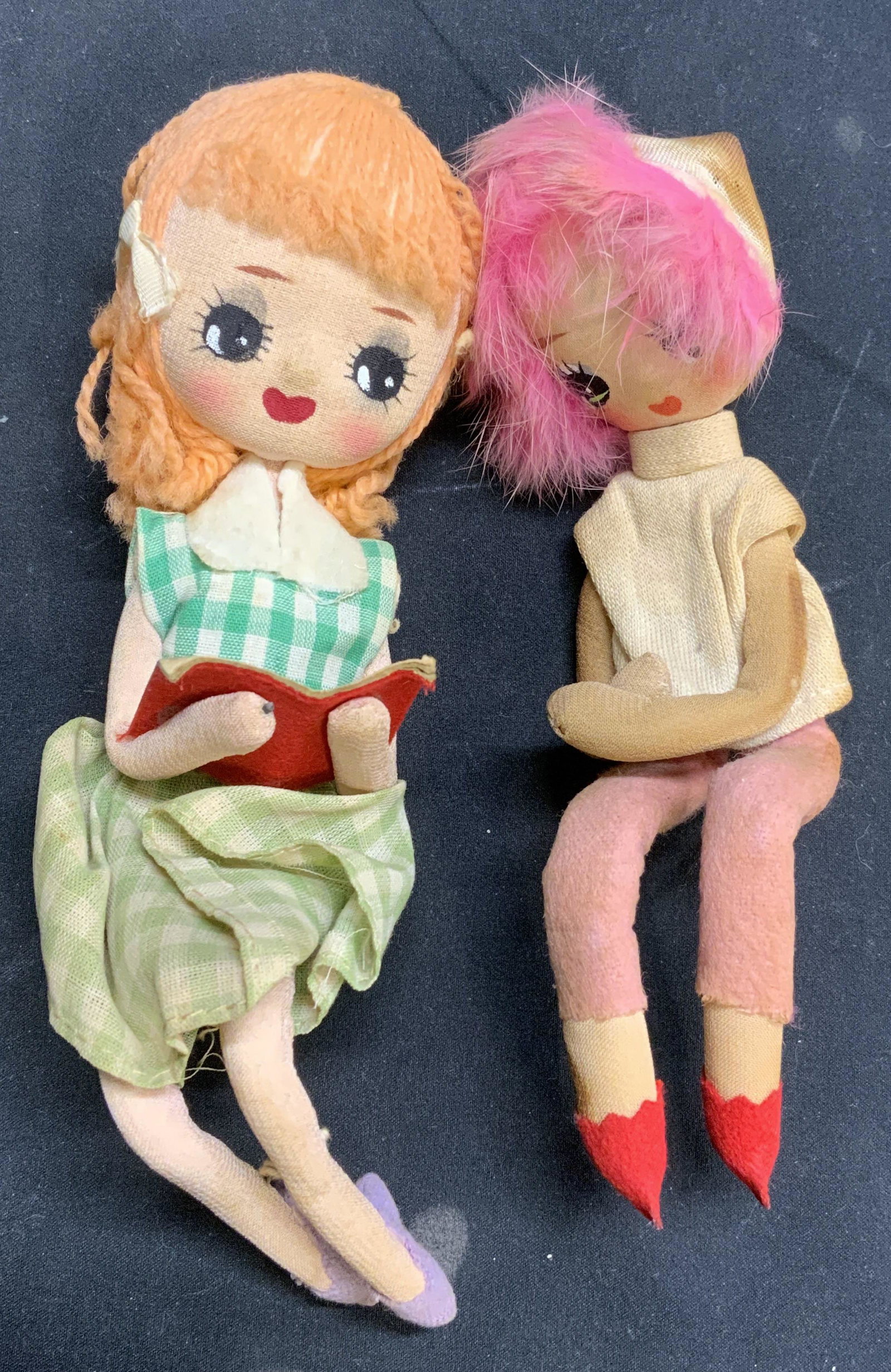 Lot 2 Vintage Fabric Dolls: Lot of 2 vintage fabric doll. Fabric and wire. Posable. Surface wear consistent with exposure. Sizes vary slightly, approx. 8 inches long. 1 doll marked made in Japan. Vintage doll, fabric doll, posab