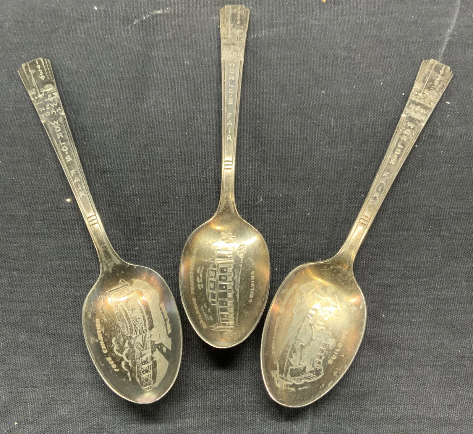 STERLING Silver VM RODGERS MFG CO Lot 3 Spoons: Each spoon reads WM RODGERS MFG CO. Spoons tested positive for sterling silver with PuriTEST tester. Front side of each spoon reads 1939 NEW YORK WORLDS FAIR. Includes RAILROAD TRANSPORTATION BUILDING