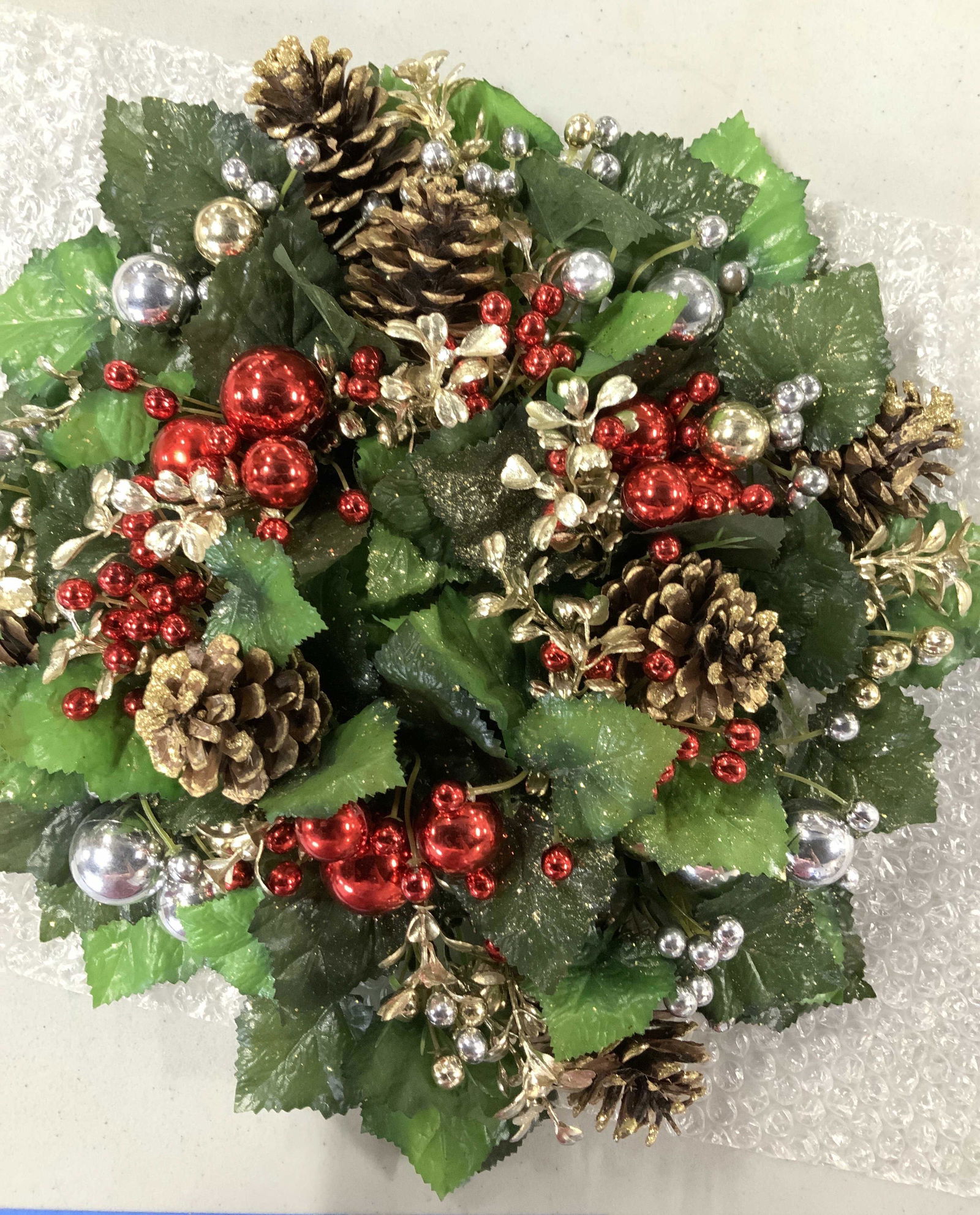 Lot 5 Christmas Wreaths and Holiday Decor: Every occasion oversized door wreath made of twigs, faux flowers and fruit, 23 in. Diameter. Faux pine Christmas wreath on wire decorated with dives, cardinal and Berry sprigs , 13. 5 in diameter. Oth