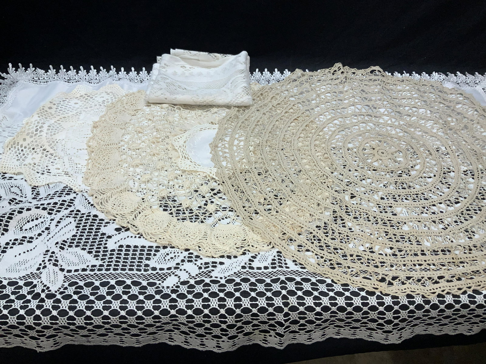 Lot 8 Vintage Crochet Doilies, Table Runners, FR: Lot of vintage tabletop furniture linens, a few handmade. Round doilies, larger measures 28 in. Diameter. Vintage Square breakfast table machine crochet tablecloth, measures 33.5 x 33.5 in. One white