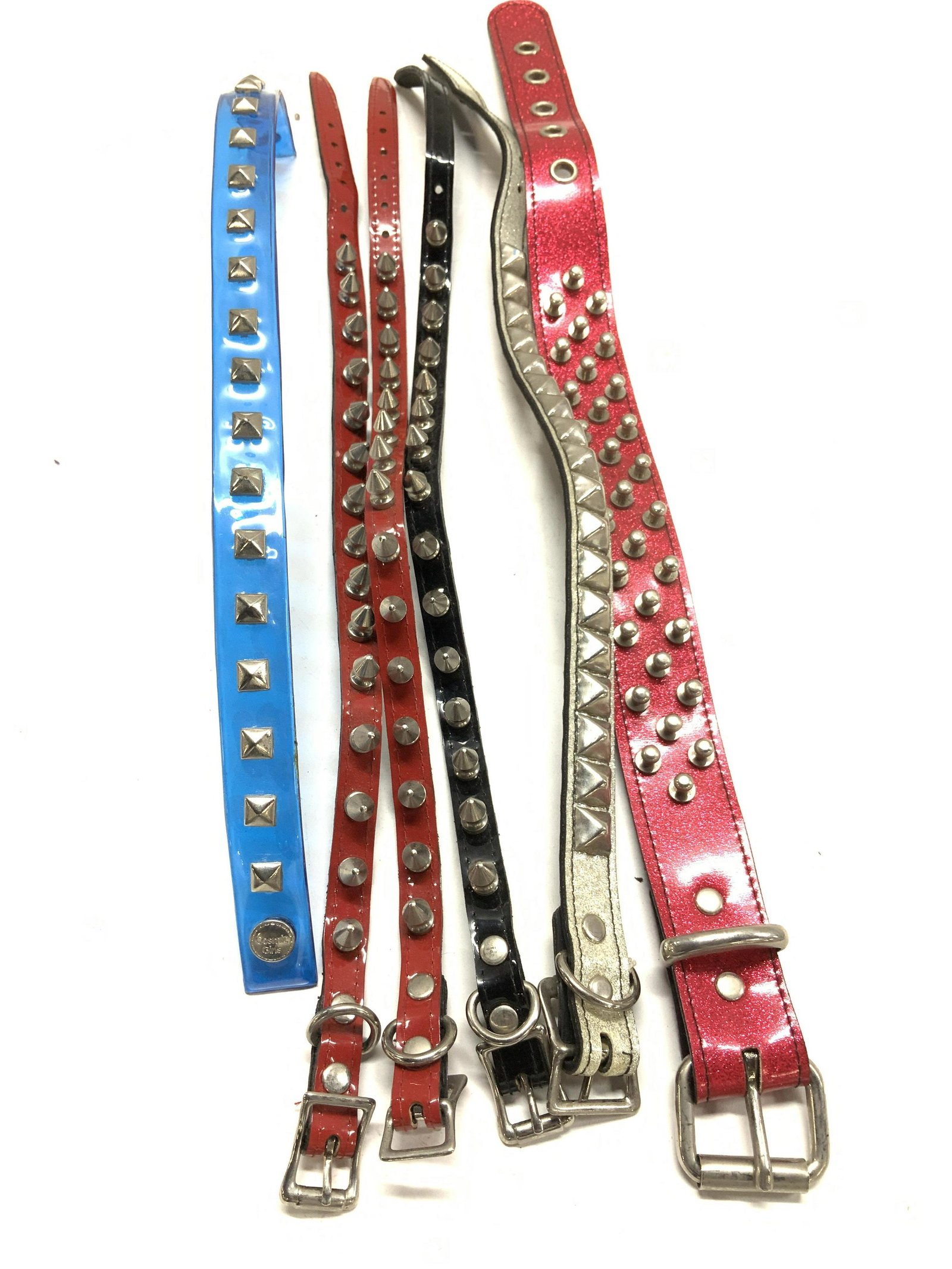 Studded Collar Necklaces Lot 6 , New: Fun fashion collars necklace jewelry. Faux Leather in several colors with brushed nickel spikes or studs. new with out tags. All but one with buckles, adjustable lengths. Red glitter collar 1.25 x 19.