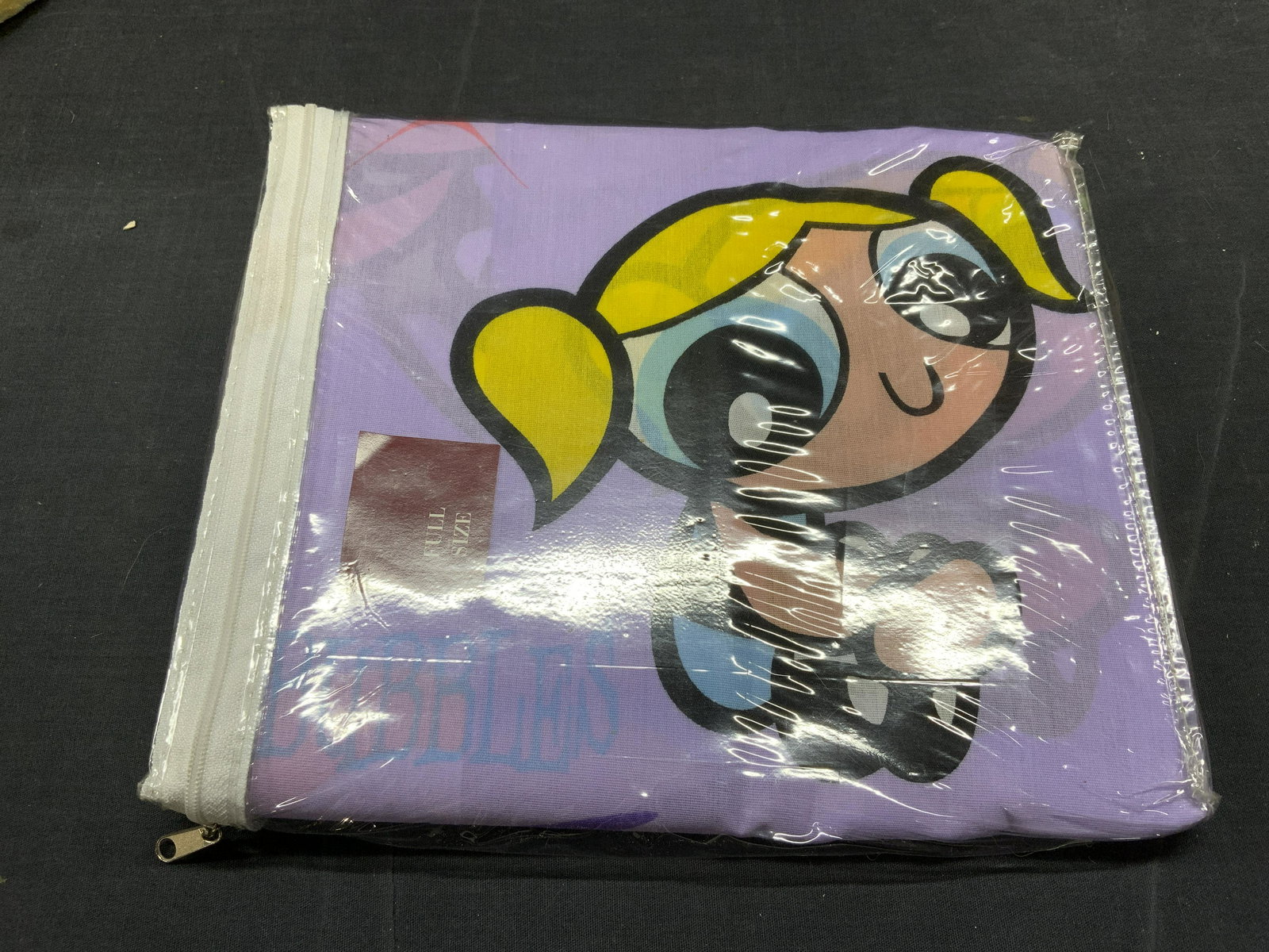 POWER PUFF GIRLS Full Size Bed Sheet NIP: Power Puff Girls purple graphic print full size flat bed sheet. Cotton/polyester blend. New in package. Not examined outside of package. Package measures approx. 11 x 9.75 inches. Power puff girls, po