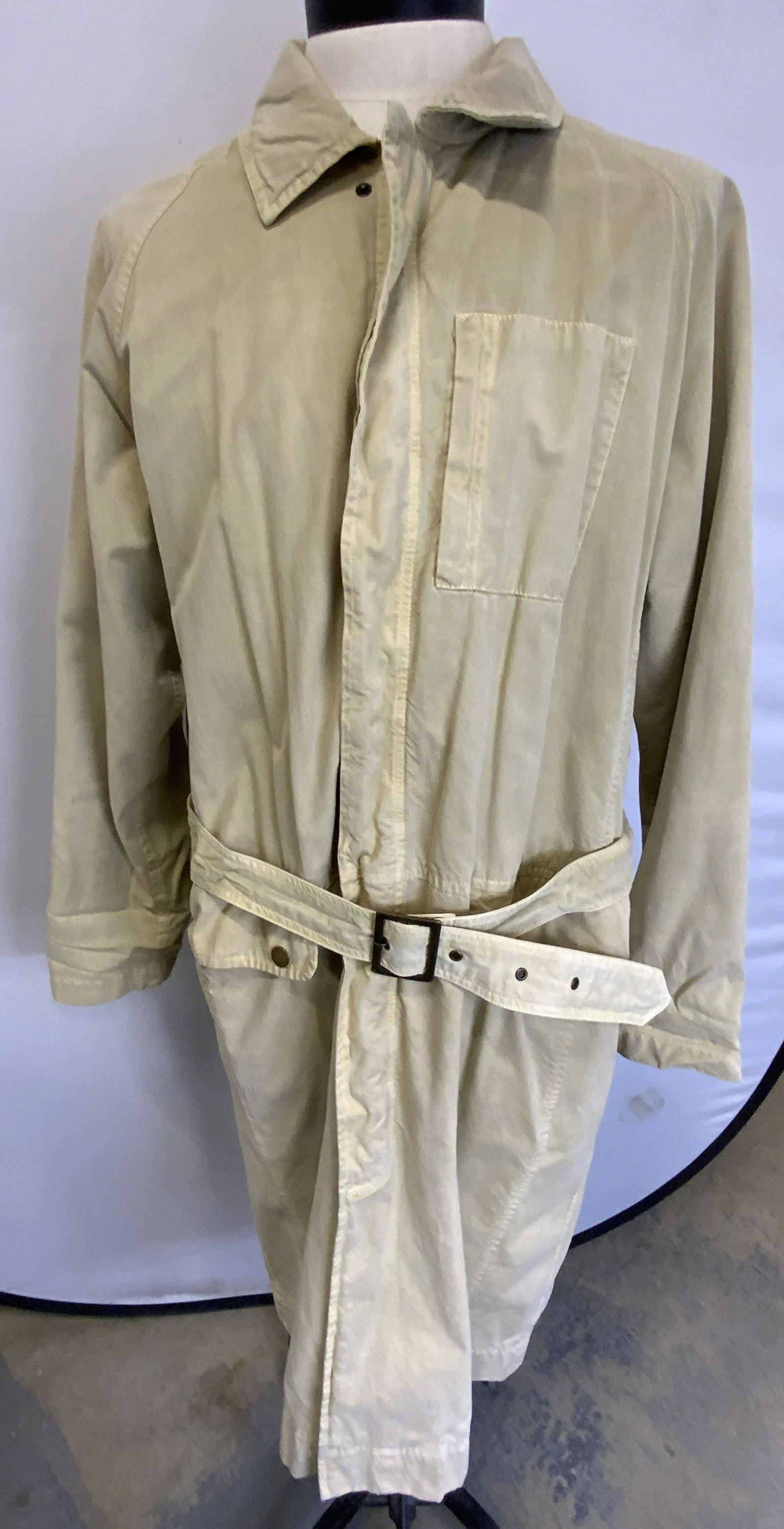 THE TERRITORY AHEAD Khaki Trench Coat: The Territory Ahead khaki trench coat. Size XL. 100% cotton. Blemishes and fading to fabric present. The territory ahead, the territory ahead jacket, mens designer jacket, mens designer trench coat, m