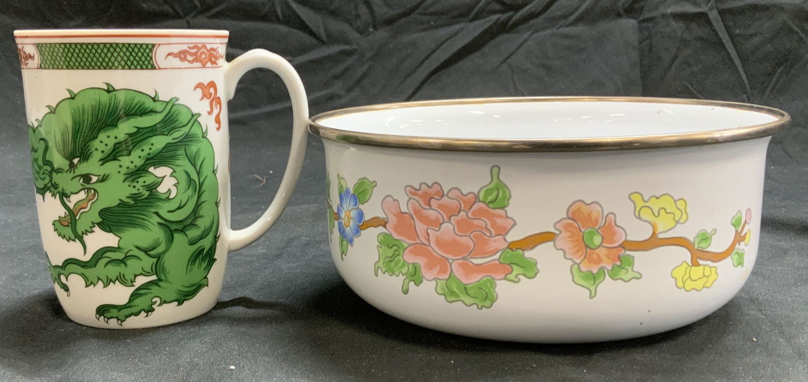 Lot 2 Fitz & Floyd Porcelain Chinese Dragon Mug: Porcelain Fitz and Floyd coffee mug depicting Chinese dragon image that wraps around mug. Signed on underside. Measures 4 in. ht, 4 in. Total width. M.Kamenstein white enamel bowl with Famille rose an
