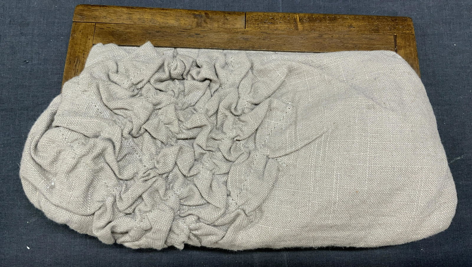 MICHAEL STARS Grey Linen & Wood Clutch Bag: Michael Stars grey linen clutch bag with wood clasp/handle. Designer label to interior. 12 1/2 in by 7 1/2 in. 1 zippered pocket and 2 slip pockets to interior. In good condition. Michael stars, Micha