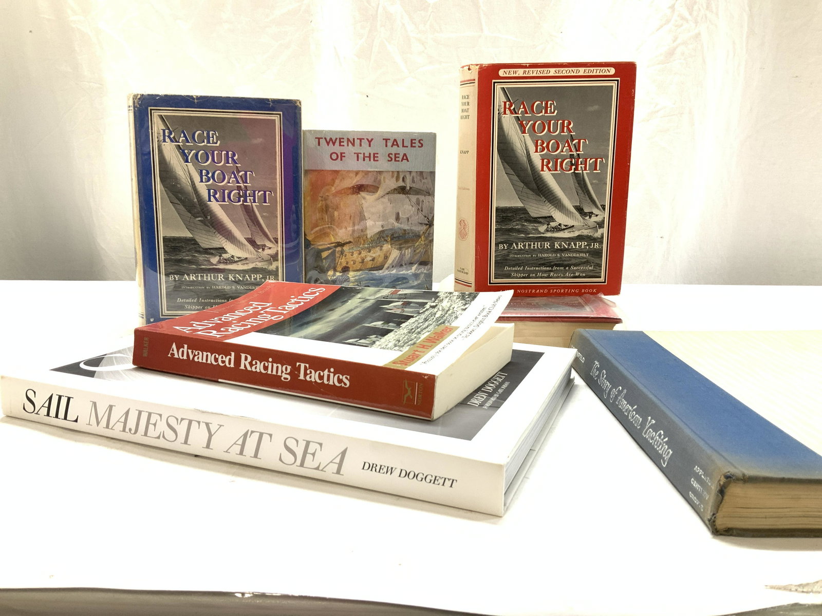 Lot 7 Vtg Sailing Books: Race your boat right by Arthur Knapp, JR. c. 1952 2 copies of Race your boat right Revised Second Edition, by Arthur Knapp, JR. c 1960. One copy wrapped in plastic. Advanced Racing Tactics by Stuart H
