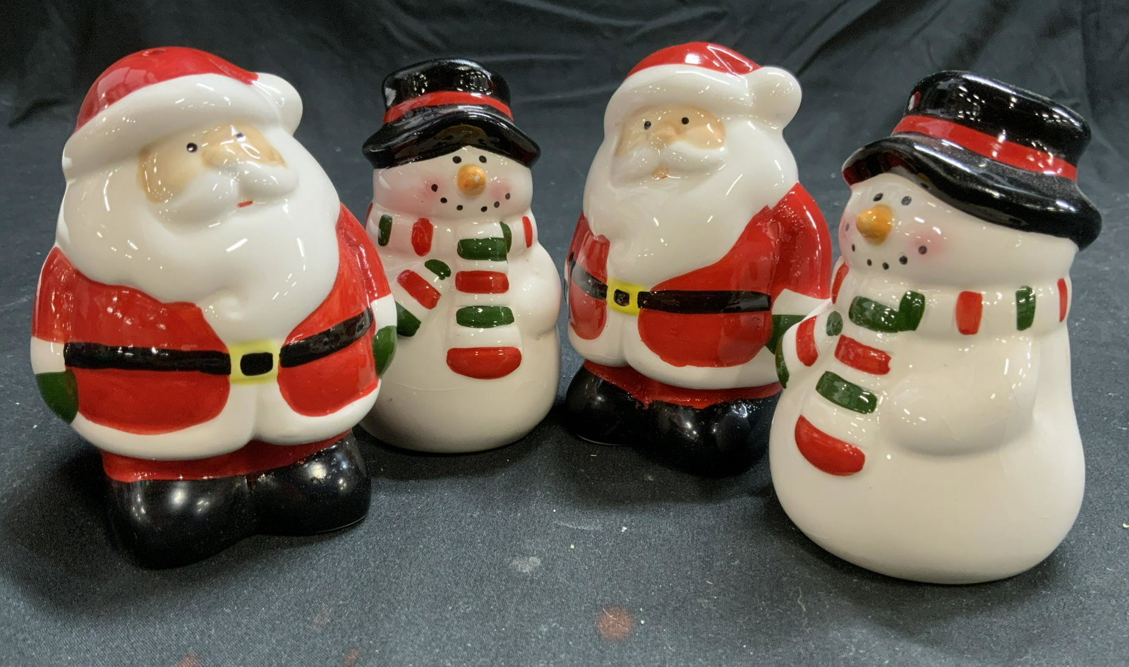Lot 4 Christmas Porcelain Salt & Pepper Shakers: Lot includes 2 Santa Claus & 2 snowman salt & pepper shakers. Each piece is porcelain. Each measures approx 3.5 inches tall 2.5 inches wide. Salt and pepper shakers, Christmas salt and pepper shakers,
