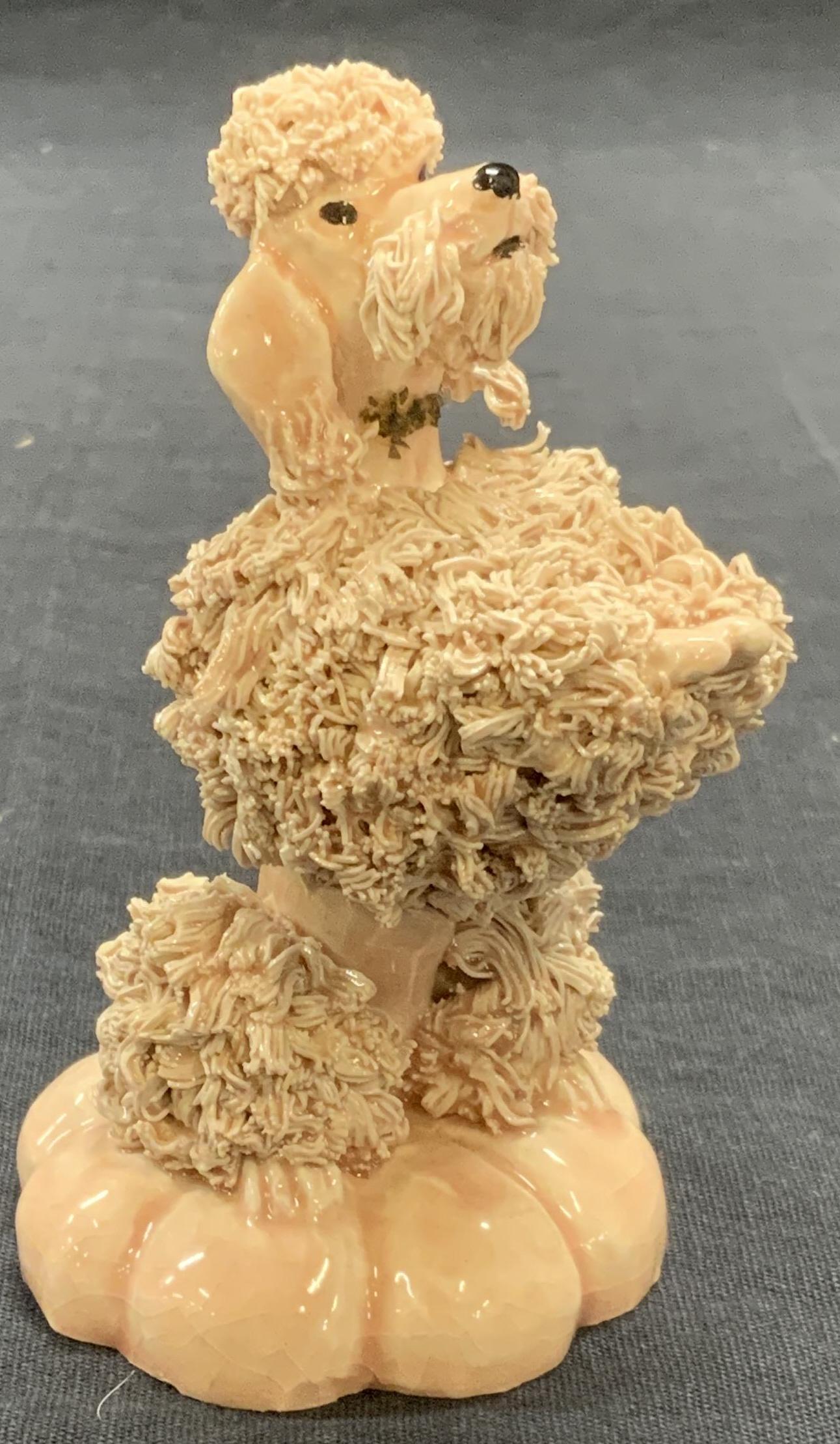 JANE CALLENDER #89 Pink Poodle Figurine: Jane CALLENDER #89 ceramic pink poodle figurine. Trademarked to underside. Made in California. Measures approx. 2 inches diameter and 3.75 inches tall. In good condition. Crazing observed. Jane CALLEN