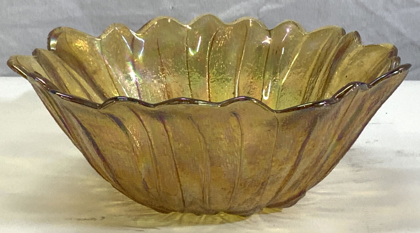 Amber Carnival Glass Flower Bowl: Thick walled carnival glass bowl in sunflower shape , smooth interior, exterior textured glass. Measures 7.25 x 2.5 in. Vintage Carnival Glass Sunflower Bowl, Amber Carnival Glass Bowl Large Trinket B