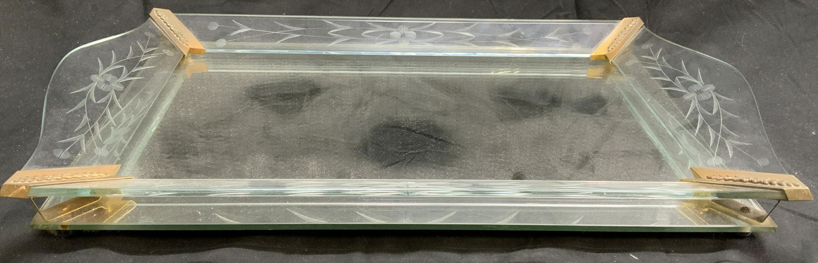 Vintage Mirrored Tray with Etched Glass: Vintage mirrored tray with etched glass decoration. Footed to underside. Measures approx. 20.5 x 11.5 inches. Surface wear consistent with exposure. Mirror, mirrored tray, decorative tray, table decor