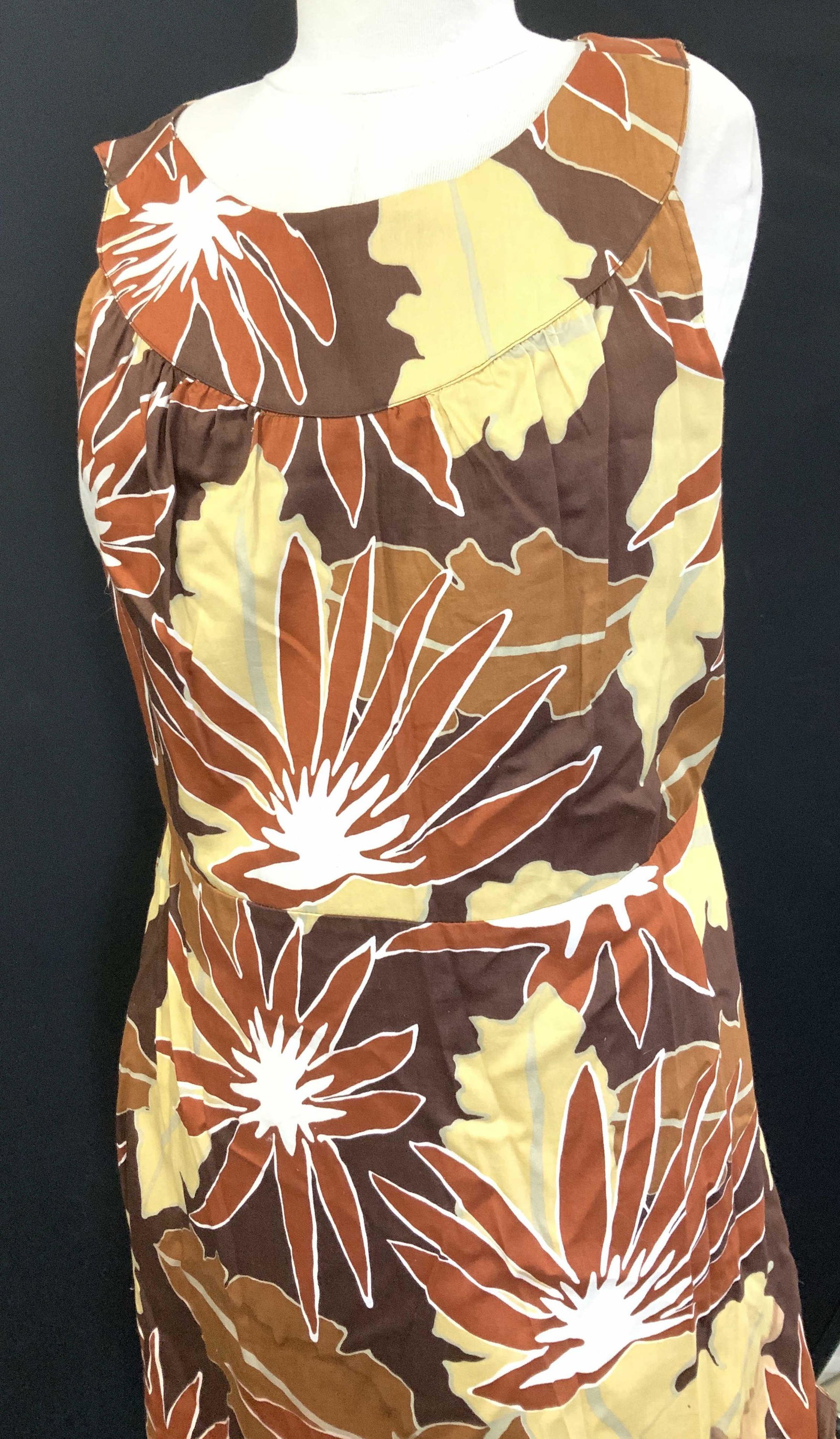 MERONA Sleeveless Summer Dress: 1960s inspired dress with rounded collar, 37 in. Long. , size 16, soft hand fabric, possibly cotton or rayon, acetate lining. Has line of bleeding fabric colors. See picture. Side zipper. Snug waist w