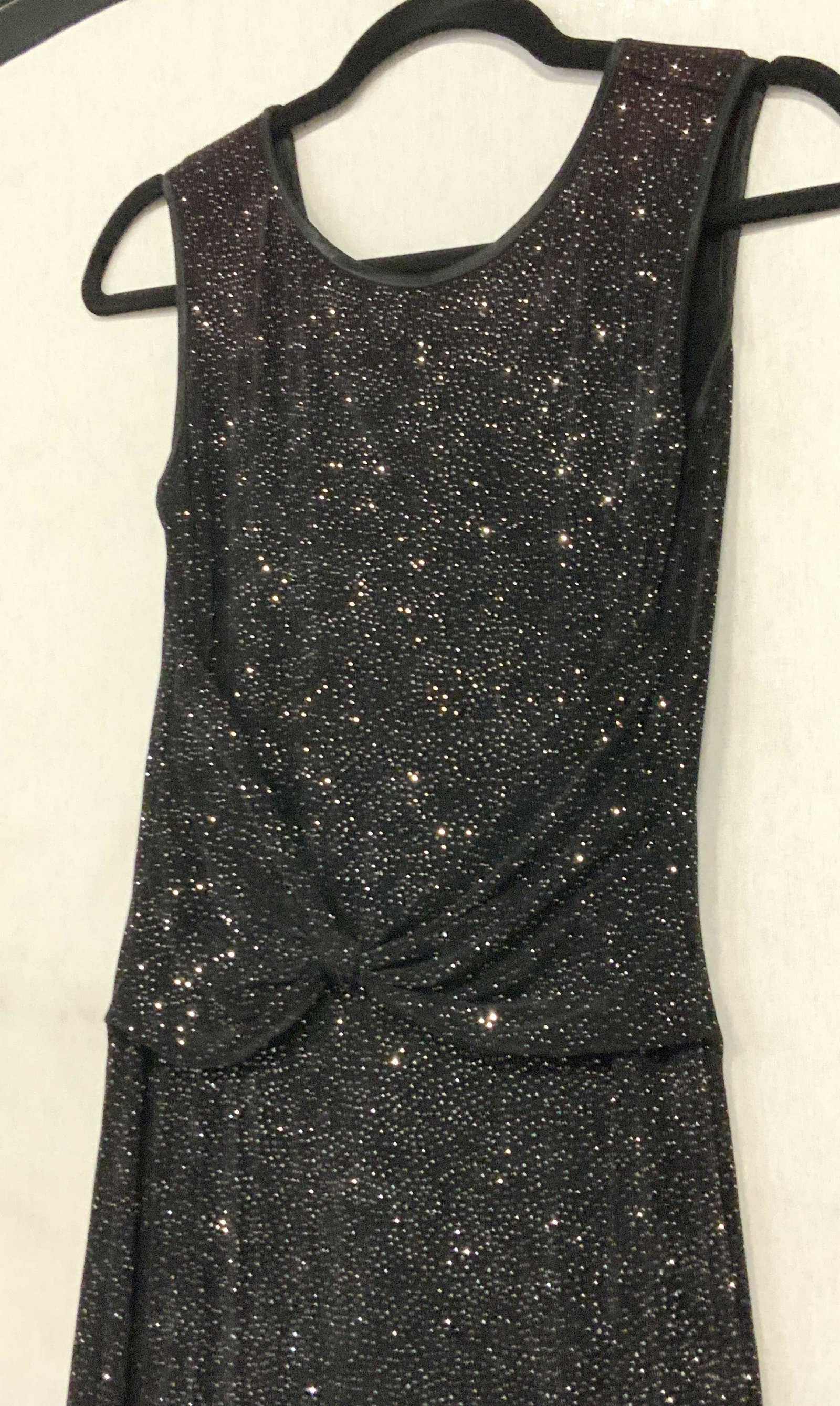 JESSICA McCLINTOCK Long Glitter Cocktail Dress: Sleeveless cocktail dress,94% acetate with 6% stretch. Hugs the body/ form fitting dress. Signed Designer on hanging straps. 57 in. Long. Silver glitter on entire dress. Waist 28 in. with a ruched fro