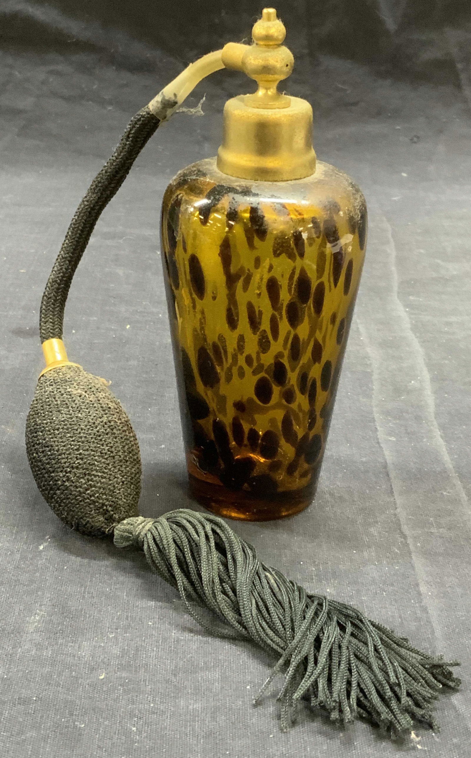 Vintage Art Glass Perfume Bottle: Vintage art glass perfume bottle. Needs repair to atomizer. Measures approx. 2.25 inches diameter and 5.5 inches tall. Perfume bottle, vintage perfume bottle, art glass perfume bottle, art glass, vani