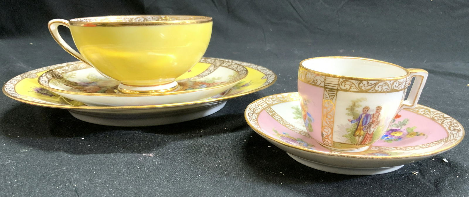 Lot 5 DRESDEN Assorted Porcelain Serveware: Lot includes 2 saucers, 2 tea cups & 1 plate. 3 dishes are white & yellow toned with ornate gilt detail, floral detail & figures outdoors detail each marked DRESDEN. 2 dishes are white & pink toned wi