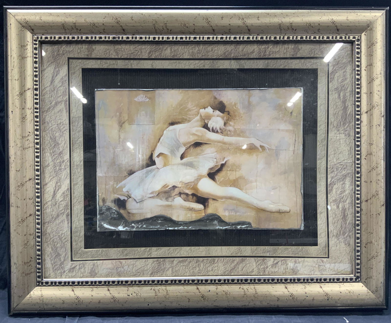 Marta Wiley Ballerina Collage Litho On Clay: Original by Marta Wiley Depicting a ballerina in floors pose with arms behind her. Litho is affixed to clay block. Framed in speckled silver toned wooden shadow box frame with double speckled silver m