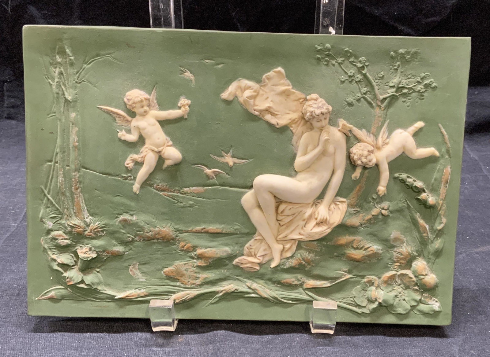 Vintage Signed Porcelain Relief Figural Decor: Vintage, possibly antique, signed porcelain decorative home accessory. Relief with female nude and cherub figures. Signed to underside, illegible. Measures approx. 9.5 x 6.5 inches. Surface wear consi