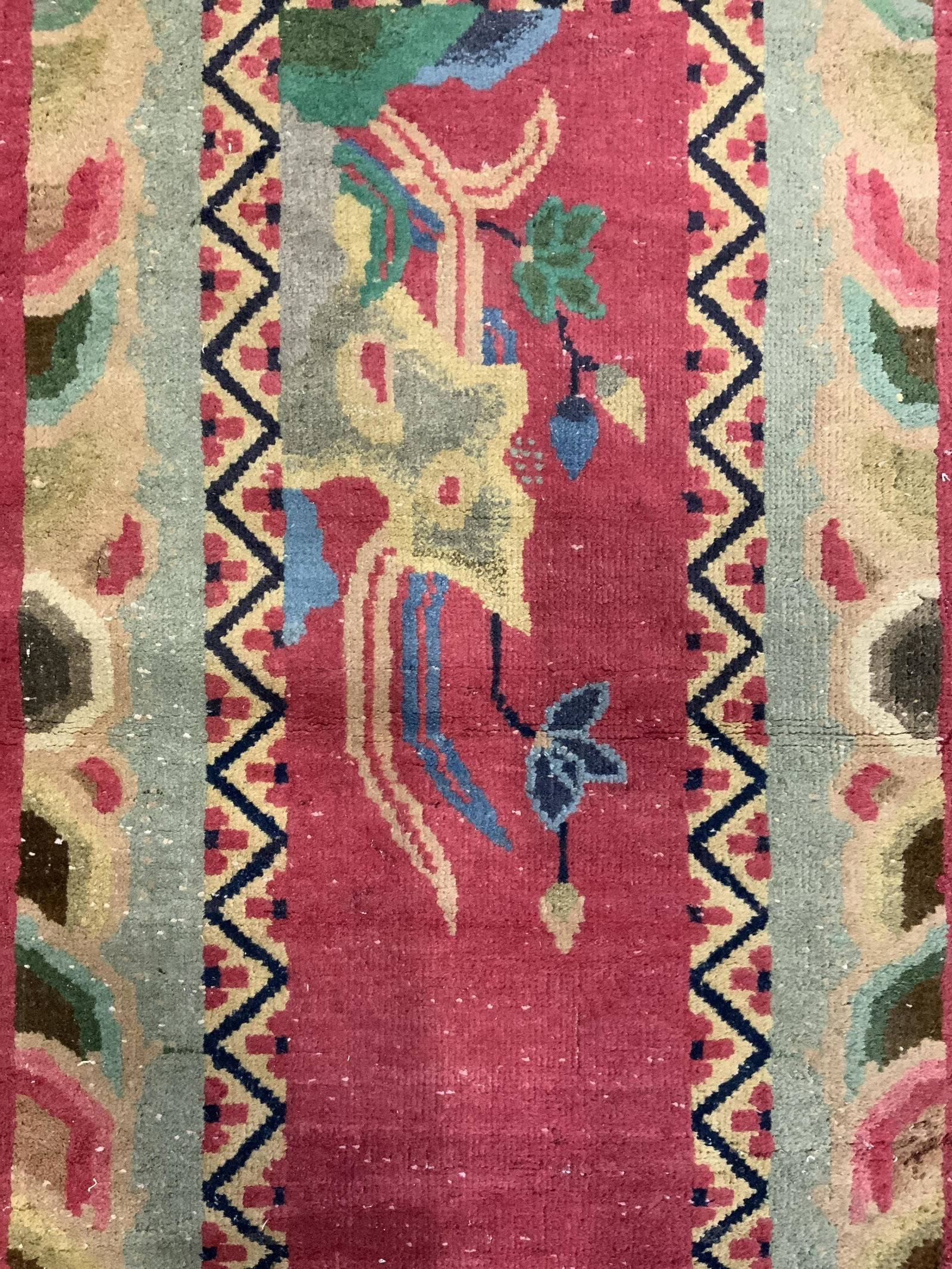 Vintage Handmade Chinese Art Deco Wool Rug: Rug is handmade and wool. Piece has intricate multi toned geometric vine and leaf detail. Rug is vintage possibly antique. Measures approx 46 inches long 25 inches wide. Rug, carpet, vintage rug, Chin