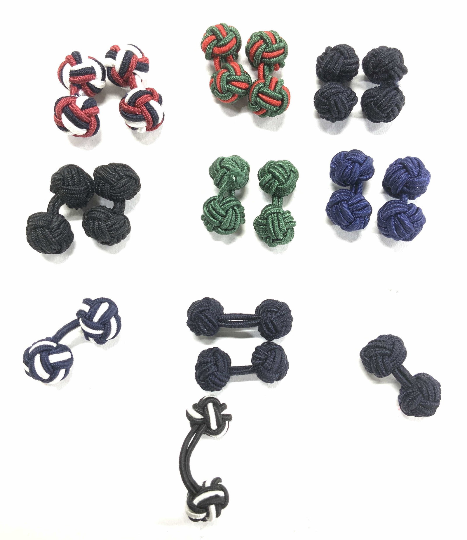 17 Chinese Jacket/ Shirt Button Knots, Cufflinks: Handmade stretch lanyard Chinese pankou knotted buttons. 7 pair and 3 singular. Just under 1 in. L button knot app 10 mm. Pair of Forest free, navy blue, green and red, burgundy- navy and white, 2 bla