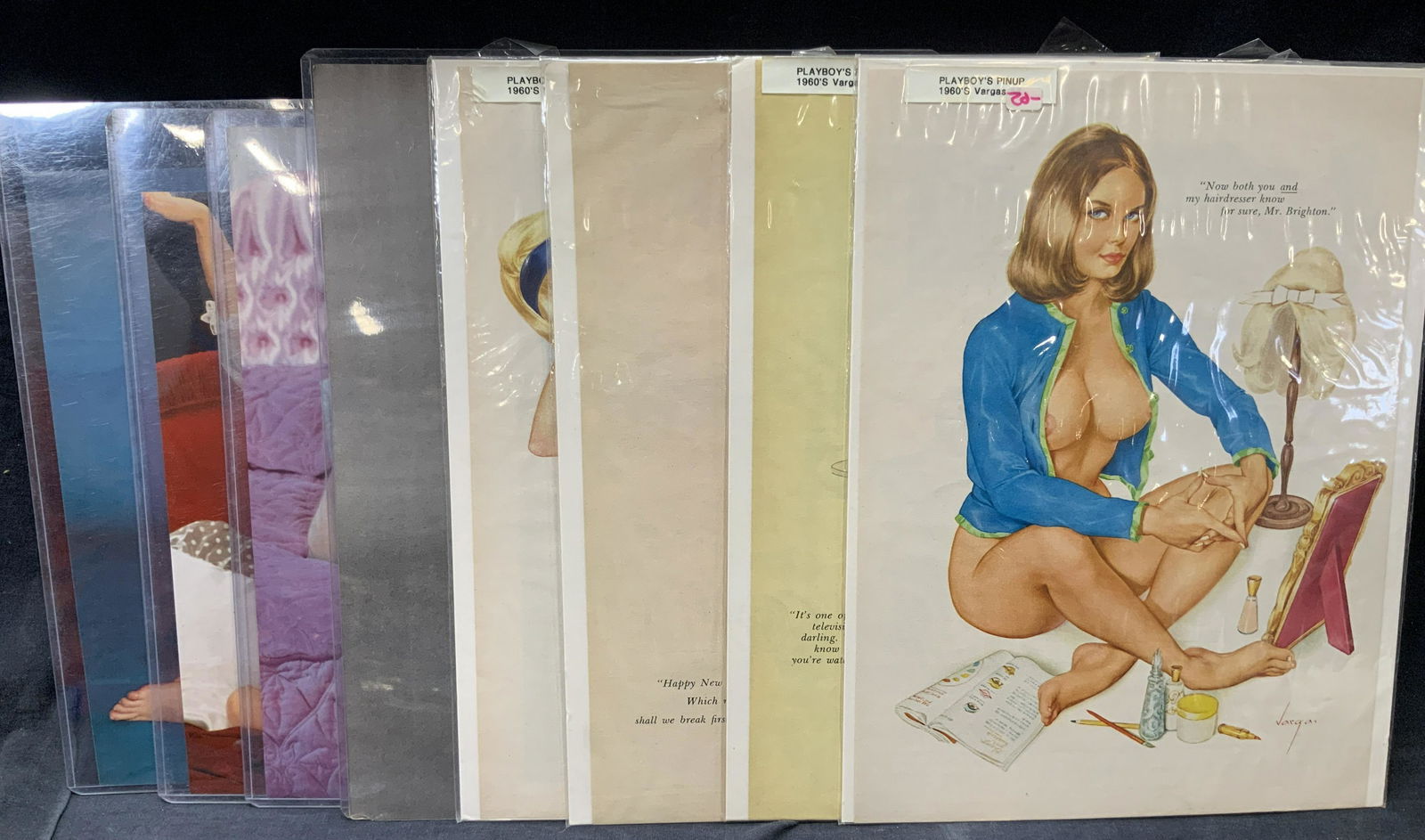 Group Lot 8 Vintage Pin Ups: Group lot of 8 vintage pin ups, 4 marked Playboys Pinups 1960s Vargas. Approximately 11 x 8.5 inches 1 black and white photograph, approximately 11 x 9 inches 3 pin ups in plastic covers, approximatel