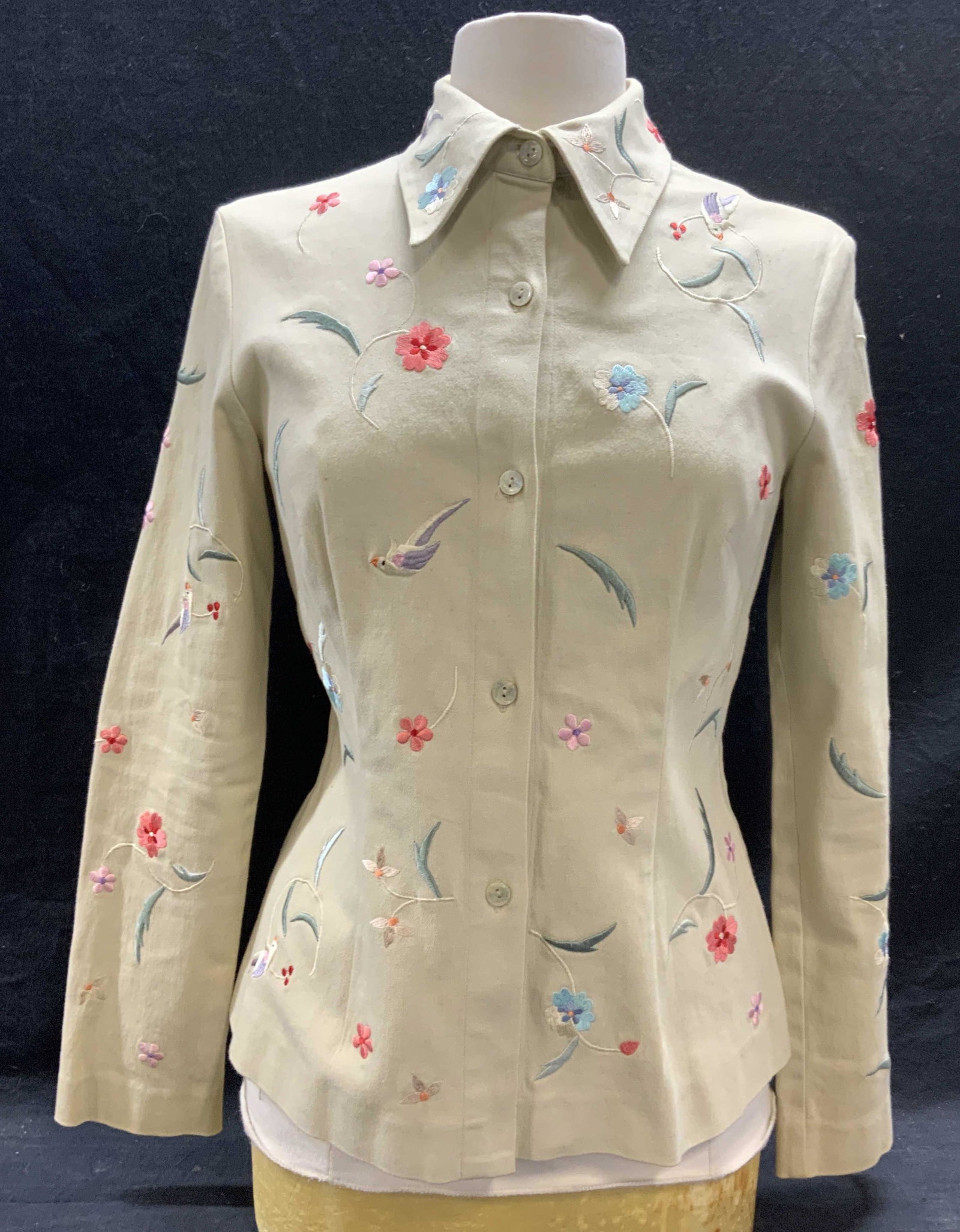 VIVIENNE TAM Floral Embroidered Jacket: VIVIENNE Tam beige jacket with floral and bird embroidery. Size 2. Cotton and spandex blend. Made in Hong Kong. Minor wear consistent with exposure. VIVIENNE tam, VIVIENNE tam jacket, ladies designer 