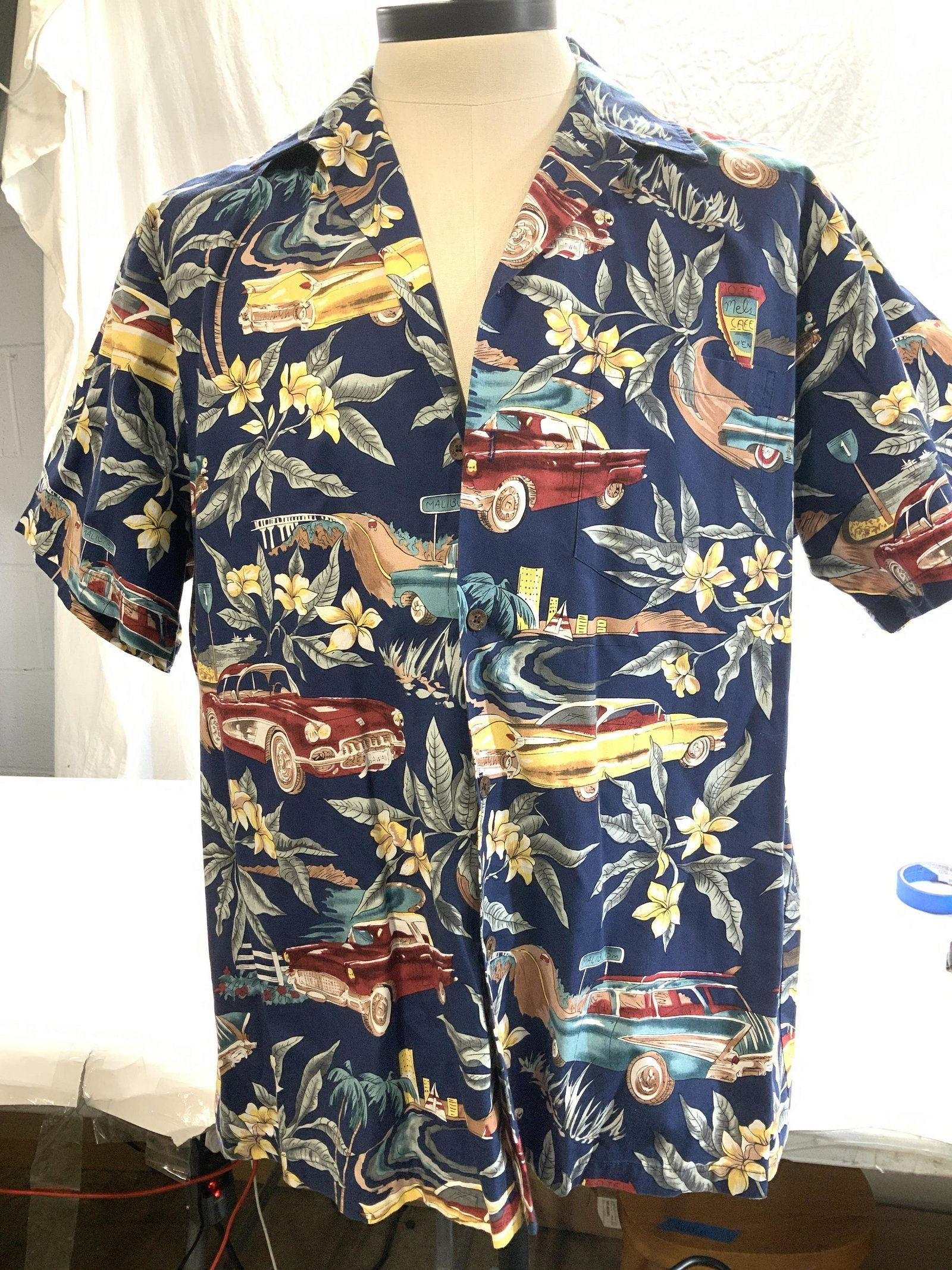 RJC Mens Cotton Hawaiian Shirt, Hawaii: Mens Hawaiian Shirt, made in Hawaii, size XL, 30 in. Long, 48 in. Waist. Navy blue with Hawaiian hibiscus flowers, and 1950s Chevy cars. Lightly worn. Mens Hawaiian Shirt, Mens Summer Fashion, menswea
