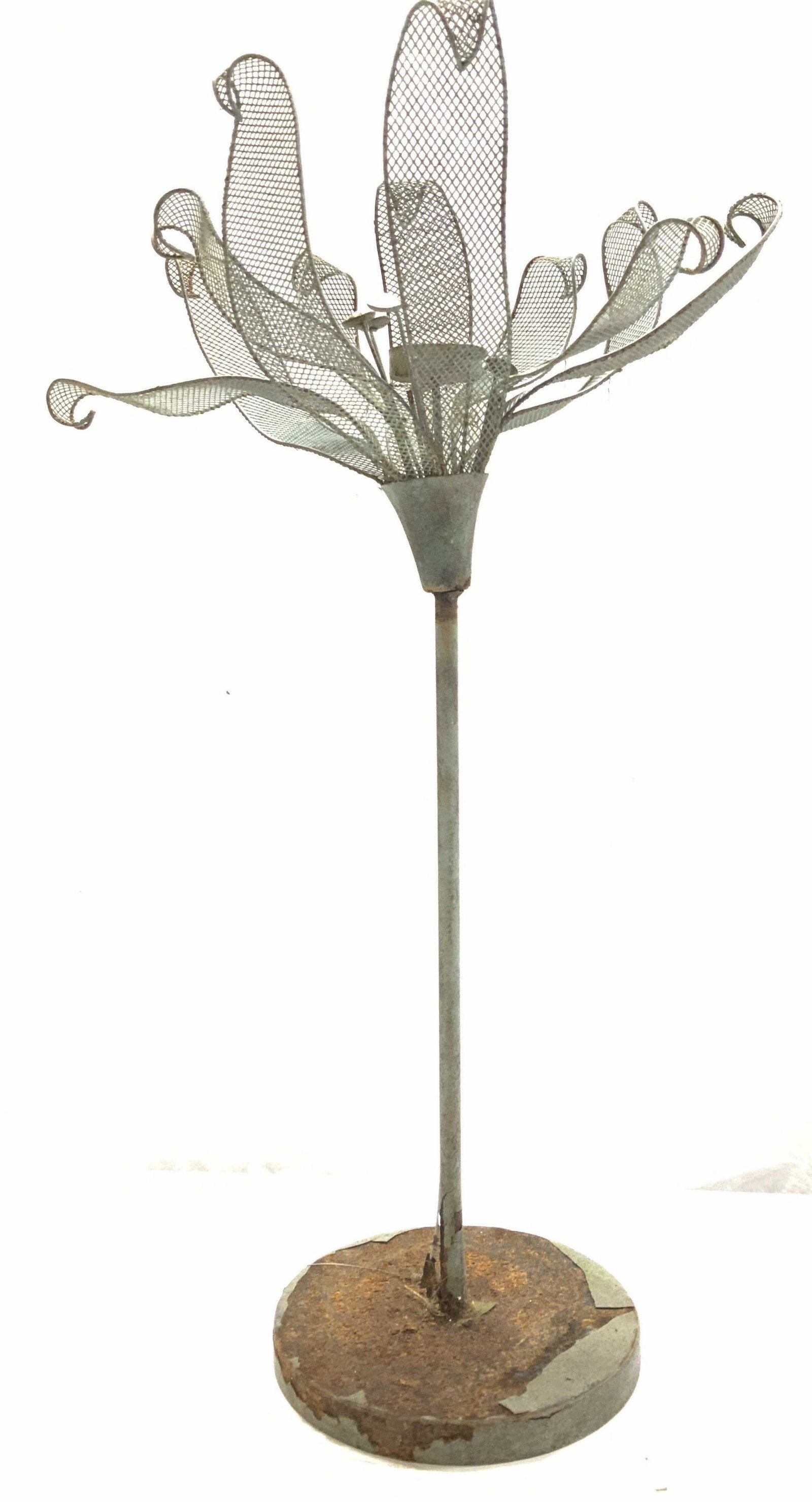 Artisanal Metal Votive Candle Holder 22inH: Tall Votive candle holder in the shape of a flower with mesh wire petals and rhinestone pestles. Center holds the candle. Heavy rusted base, wear to surface consistent with weather exposure. Measures 