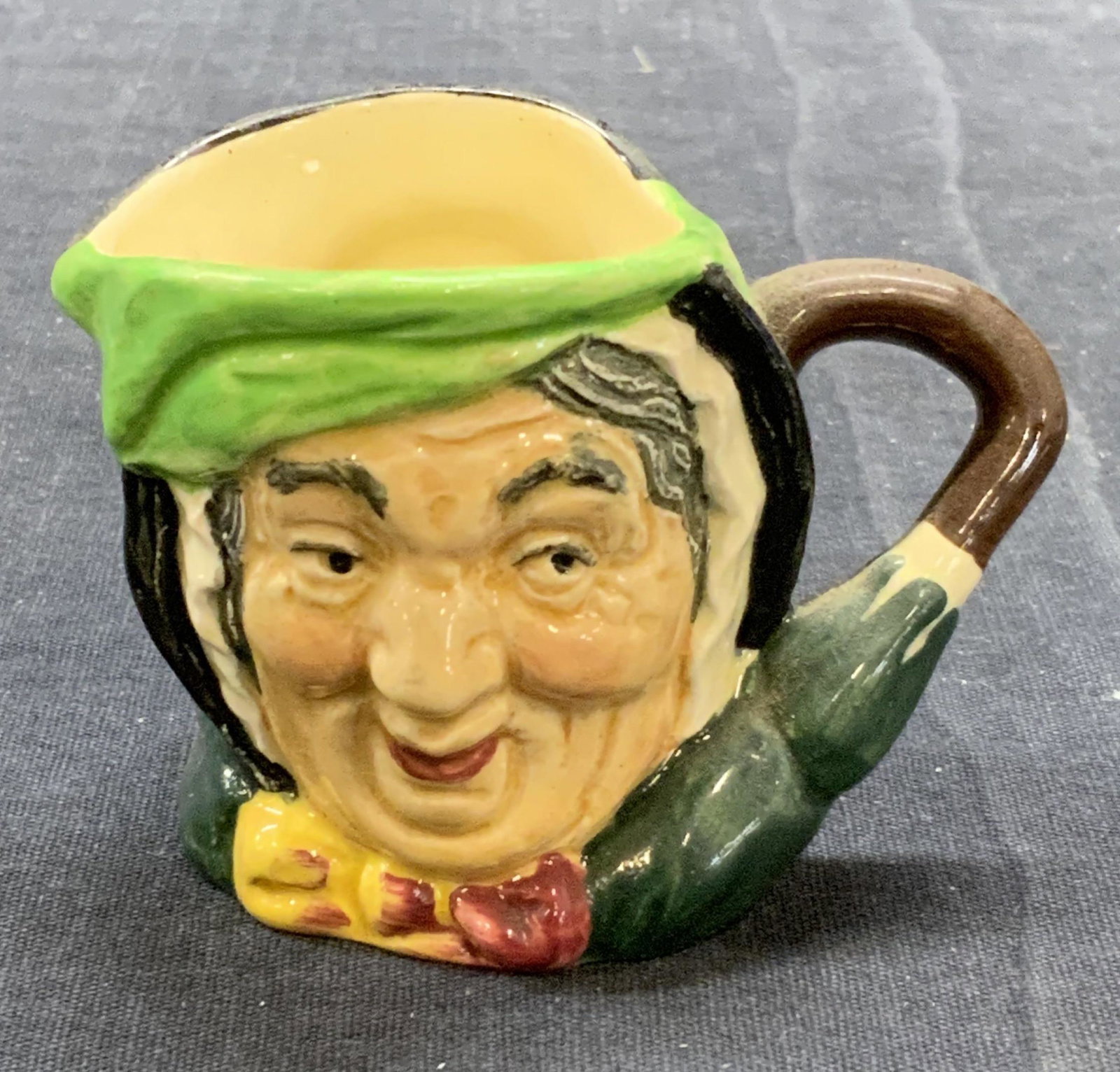 Vtg ROYAL DOULTON Ceramic Toby Creamer: Vintage Royal DOULTON figural Sairey Gamp ceramic Toby character creamer. Trademarked to underside. Made in England. Measures approx. 3 x 2 x 2.25 inches. Surface wear consistent with exposure. Royal 