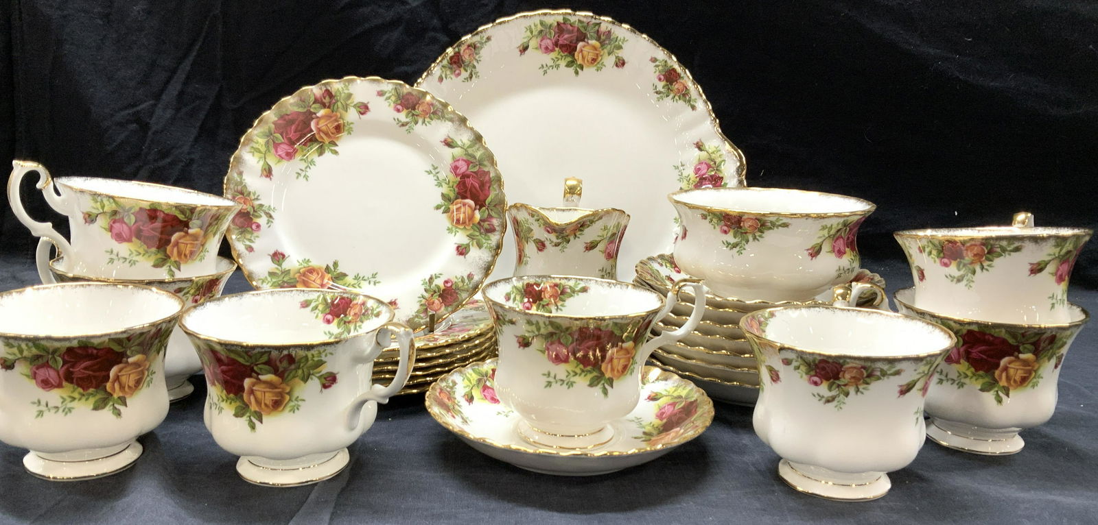 Royal Albert Old Country Roses Chinaware, 26: Royal Albert Chinaware, Made in England. Bright white porcelain with hand painted roseswith 24k gold edges All pieces are Hallmarked. Pattern is Old Country Roses. Set Consists of serving Plate, 9.25