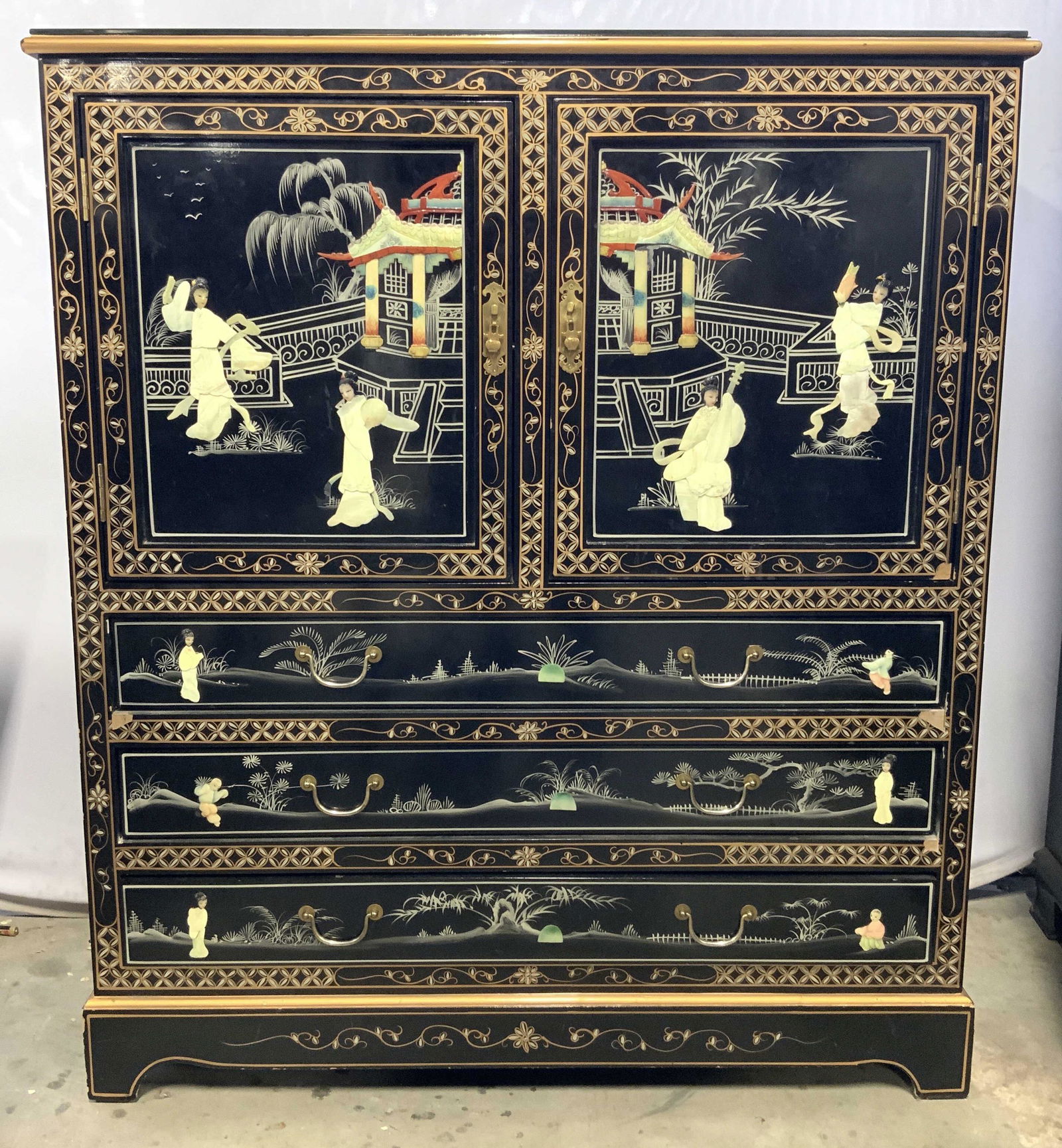 Vtg Lacquer Wood Asian Bureau W Mother Of Pearl: Oriental bureau in lustrous black Chinese lacquer with hand carved mother of pearl inlays and hand painted landscape detail. Top of piece has glass top. Credenza has shelf behind doors in top, and thr