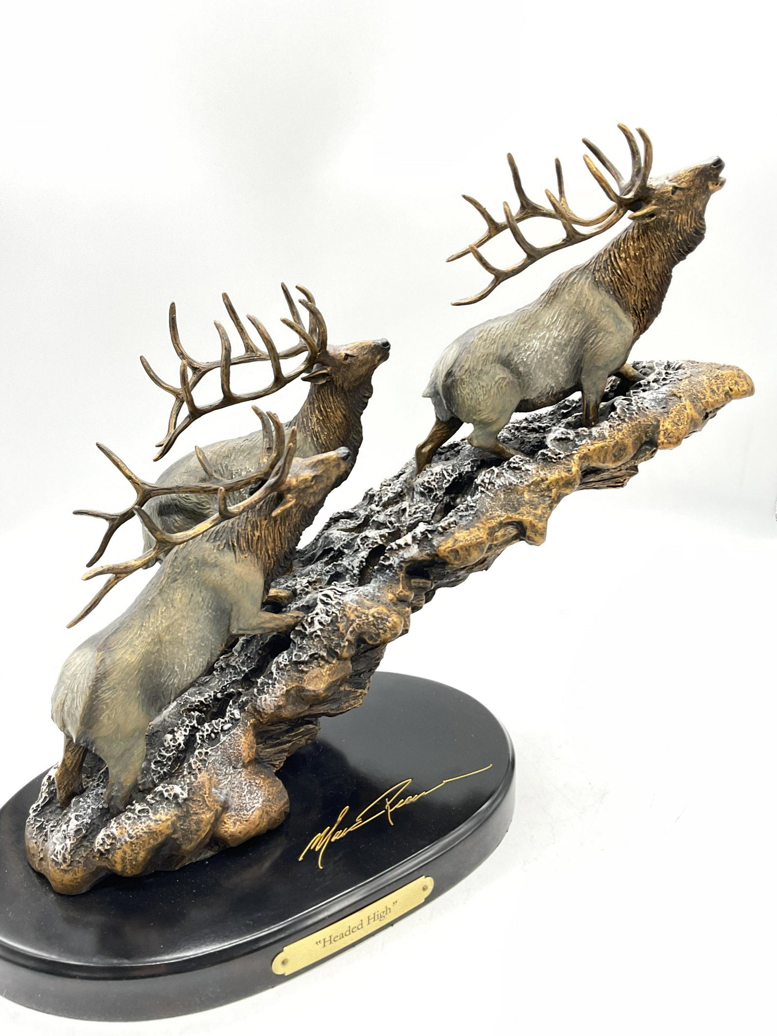 M.Pierce Bronze & Resin Sculpture , Elk: Marc Pierce Bronze & Resin Sculpture Headed High Big Sky Carvers. Measures approx 7 x 16 x 12.5 inches. Sculpture by Marc Pierce from Big Sky Carvers entitled, Headed High. It shows 3 elk climbing up,