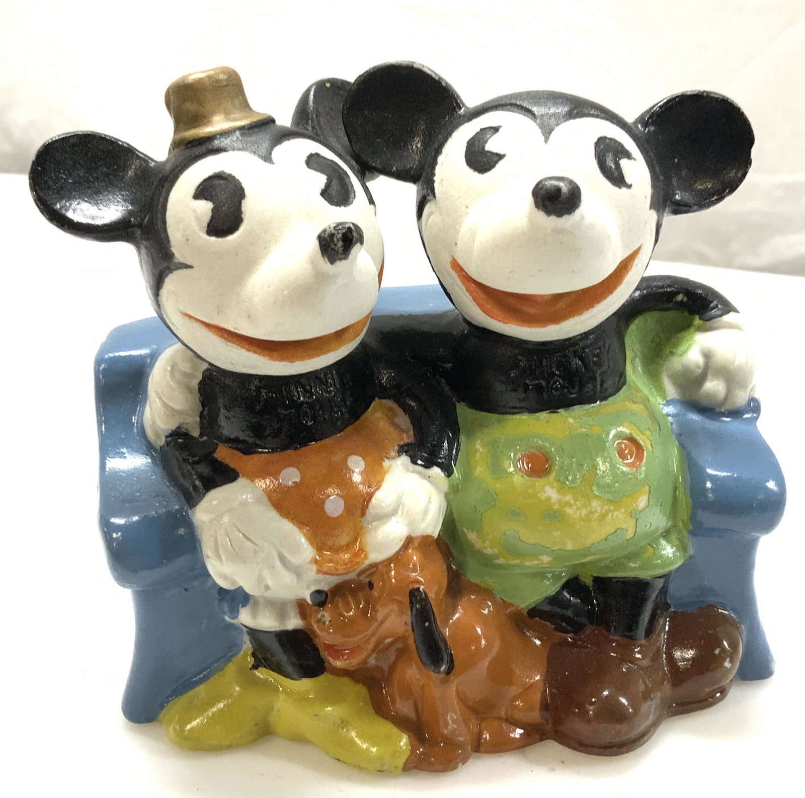 Disney Minnie&Mickey Porcelain Toothbrush Holder: c. 1930s signed Mickey and Minnie Mouse hand painted porcelain Toothbrush Holder. Backside reads copyright Walte Disney made in Japan 5385. These is a puppy PLUTO in between Mickey and Minnie whilst t