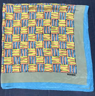 RODIER Hatched Patterned Silk Scarf: Marked on lower right corner RODIER, soft hand, feels like silk. Center is adorn with cross hatching pattern with blue, yellow and orange with green boarder and blue had rolled edges. Approximately 34