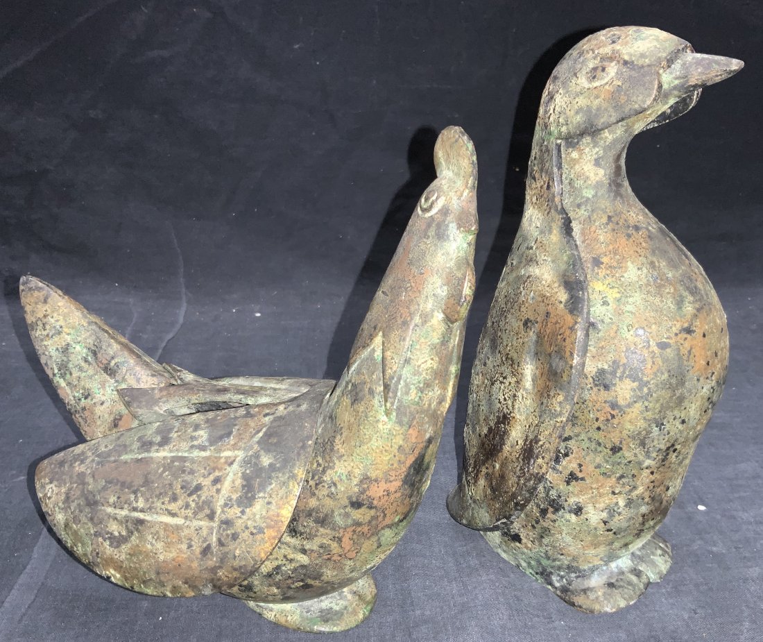Lot2 Vintage Bronze Bird Mold & Censer, Japan: Pair of vintage, possibly antique bronze birds1 possibly bronze bird mold, marked Japan on underside, approximately 8 inches tall.Comes in two pieces that can disconnect.1 Possibly bronze. Made of non