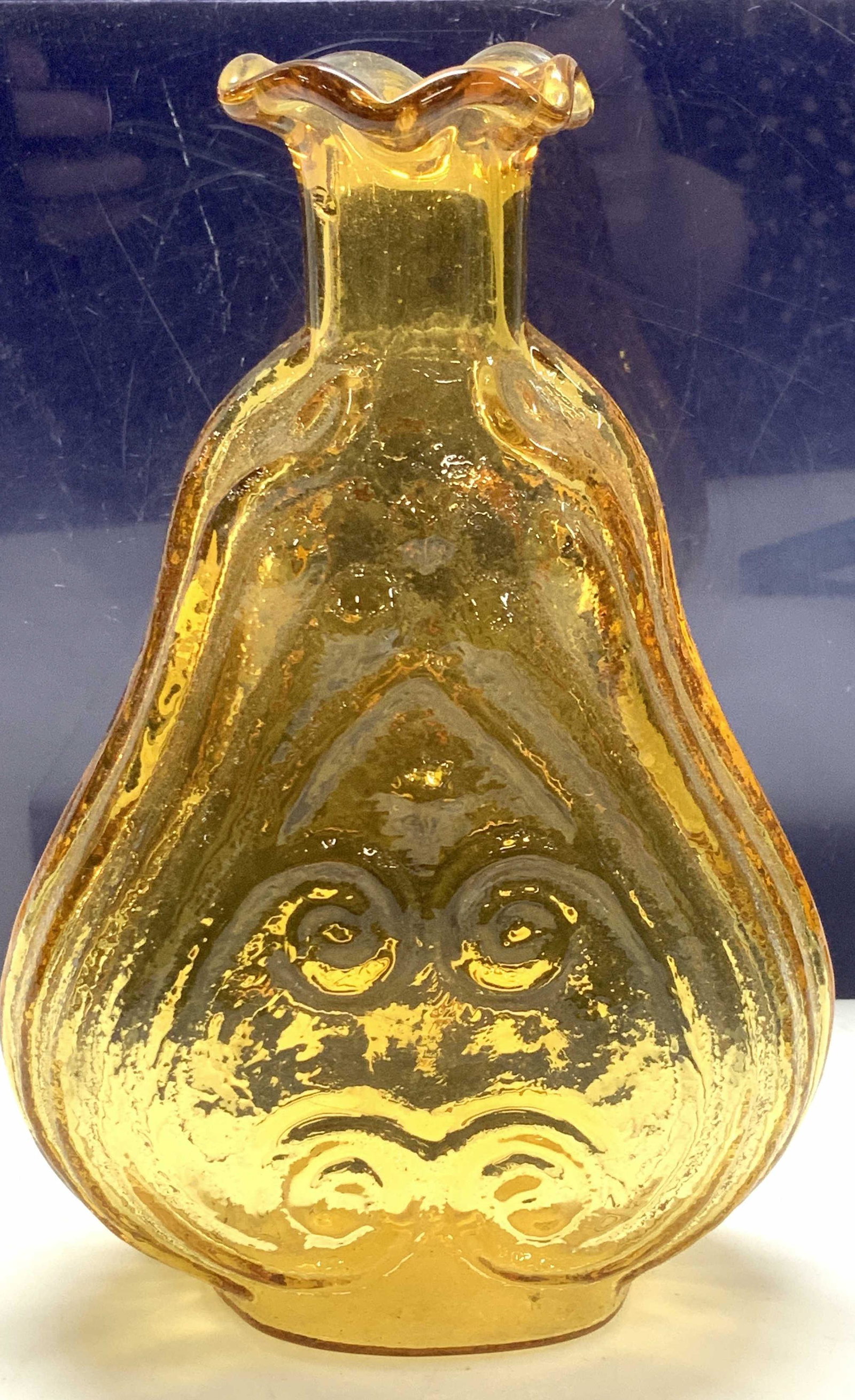 Decorative Saffron Flower Tn Embossed Glass Bottle: Saffron Toned glass bottle/ vase with furled rim, embossed linear and scroll decor. Measures 7 x 5 x 2 in. Glass Bottle, Glass Vase, Flower Vase, Decorative arts, Home decor and accessories, Colored G