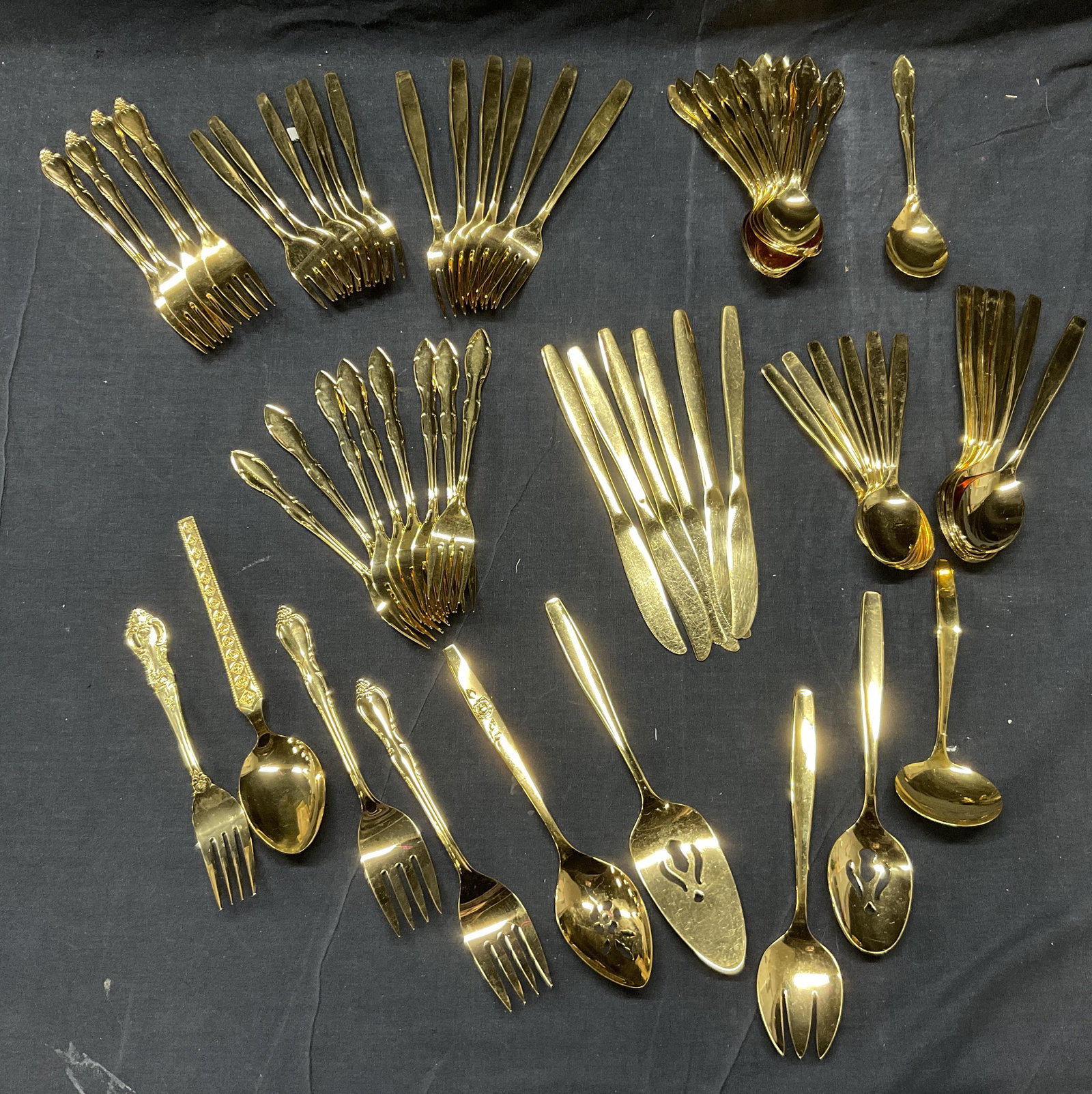 64pc Gold tn Stainl Steel Utensils WMA Rogers more: 64 Pc. Gold Tone Stainless Steel Utensils. Names to utensils include, WMA Rogers Stainless, Rogers Cutlery Co Stainless USA, Continental Stainless Japan, Royal Gallery Korea,. Largest utensil measures