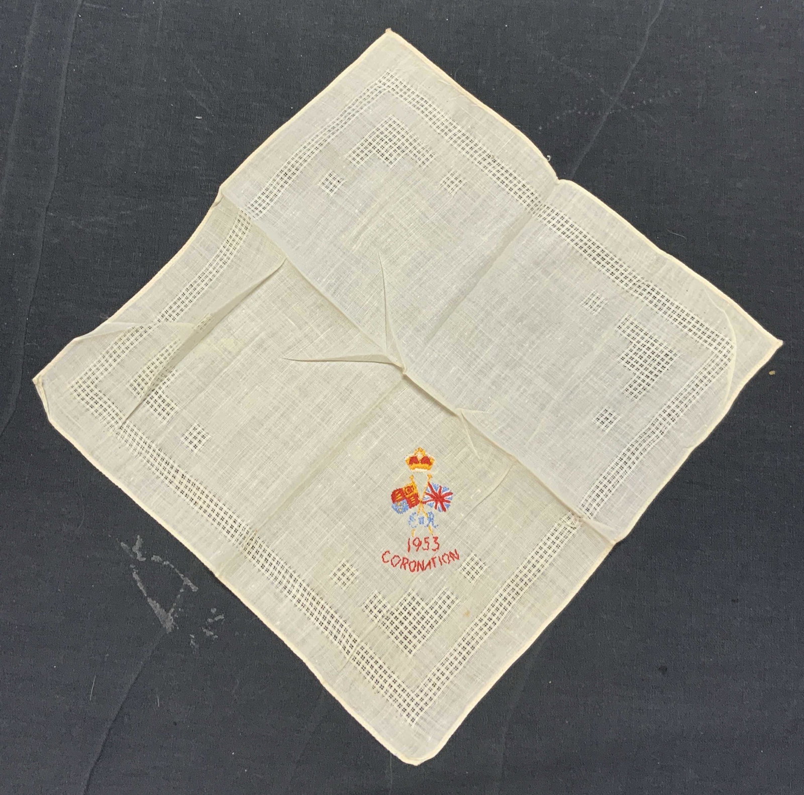 1953 Coronation White Embroidered Handkerchief: Vintage 1953 Coronation white cotton handkerchief, hand embroidered decoration. Measures approx. 10 x 10 inches. Some wear consistent with exposure. 1953 coronation, coronation handkerchief, embroider