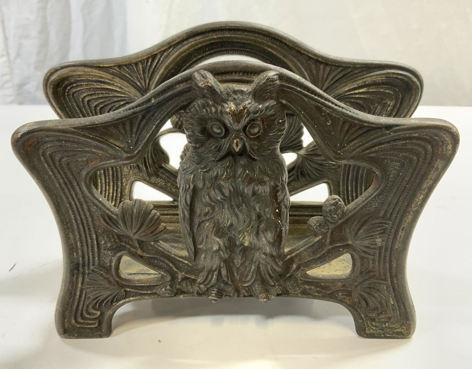 Vntg Art Nouveau Brass Owl Letter Holder: Letter holder is vintage possibly antique. Piece has owl, floral & leaf detail. Piece is footed. Measures approx 7.5 inches long 5 inches tall 3 inches deep. Letter holder, napkin holder, art nouveau,