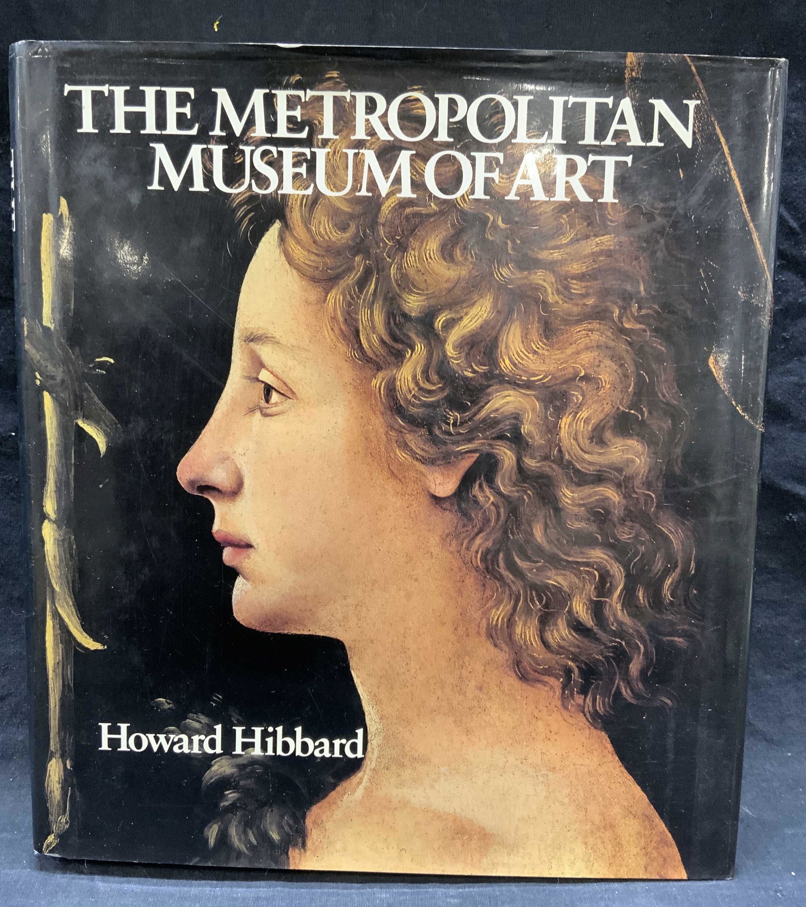 The Metropolitan Museum of Art by Howard Hibbard: Hardcover copy of The Metropolitan Museum of Art by Howard Hibbard. Published by Harrison House, 1986. Wear to dust jacket, cover, pages, and spine consistent with exposure.inscription to flyleaf. Mea